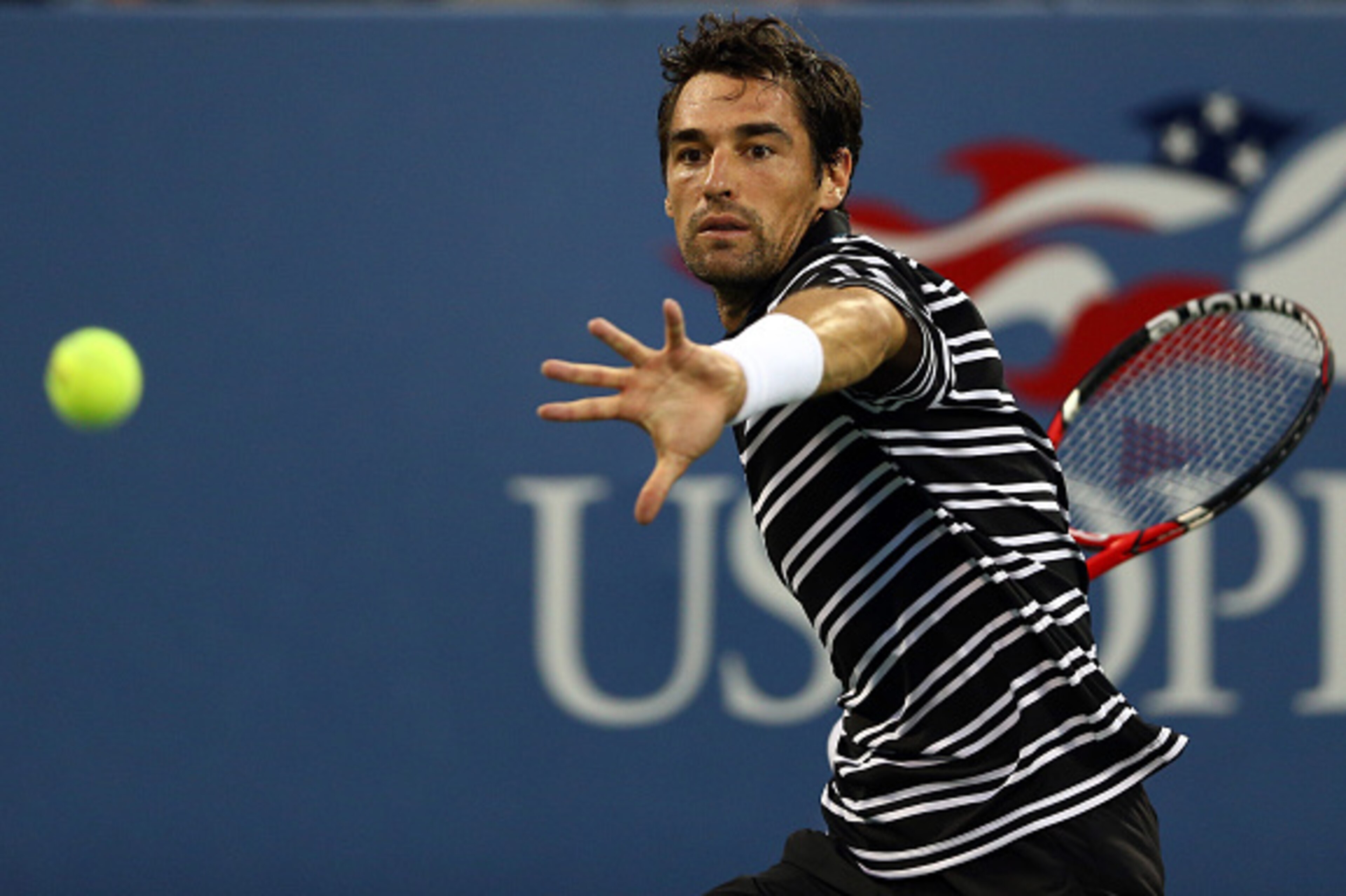 NEW YORK, NY - SEPTEMBER 04:  Jeremy Chardy of France returns a shot against David Ferrer of Spain during their Men's Singles Third Round match on Day Five of the 2015 US Open at the USTA Billie Jean King National Tennis Center on September 4, 2015 in the