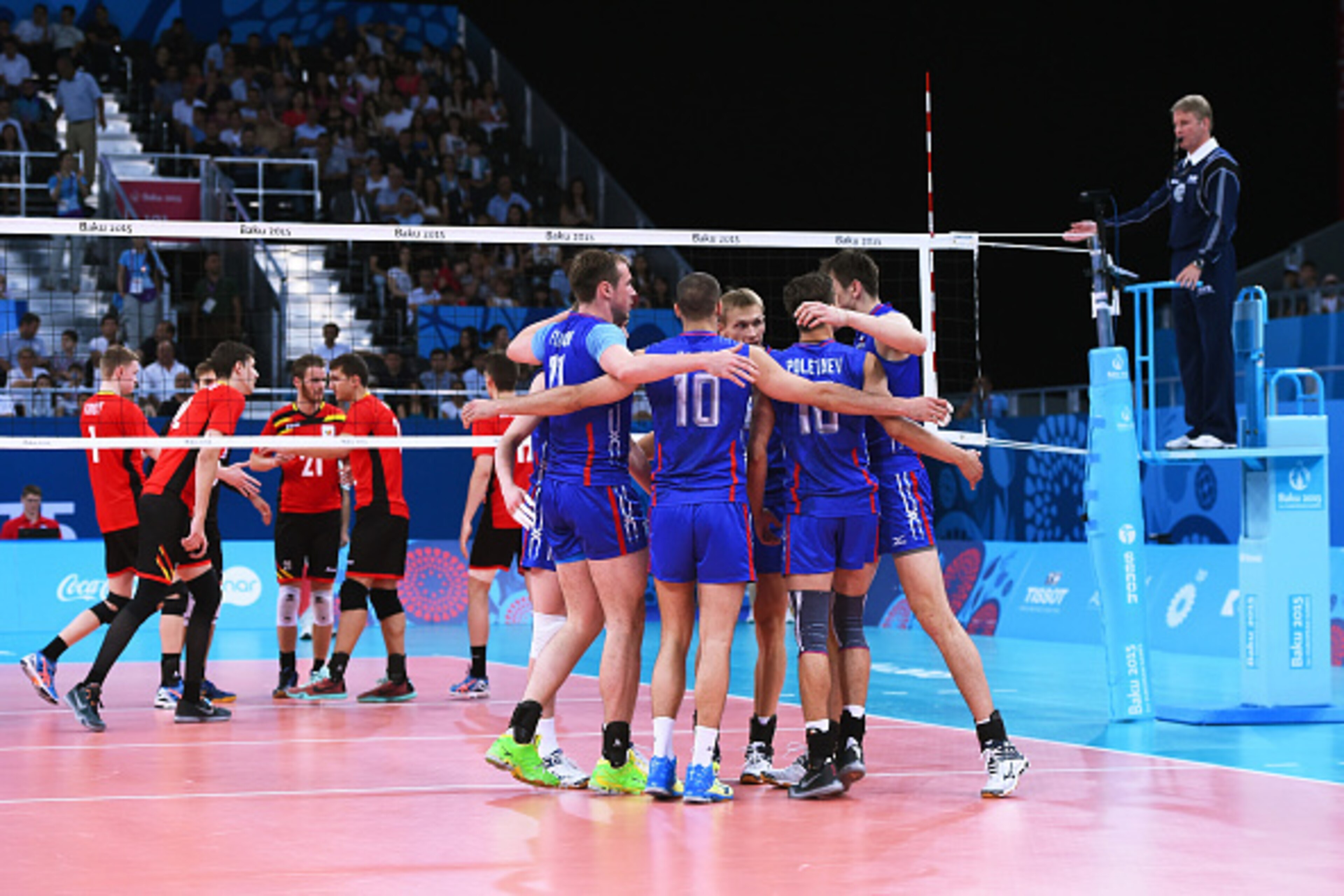 BAKU, AZERBAIJAN - JUNE 16:  Russia players celebrate during the Men's Volleyball Group B match between Russia and Belgium at Crystal Hall on day four of the Baku 2015 European Games on June 16, 2015 in Baku, Azerbaijan.  (Photo by David Ramos/Getty Image