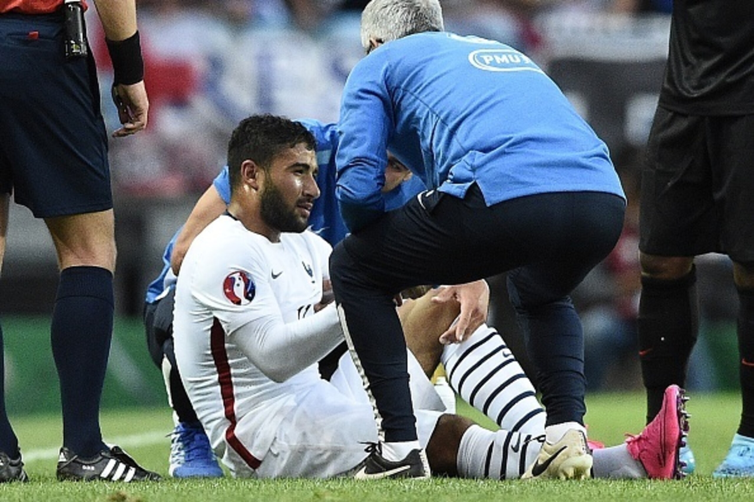 France's forward Nabil Fekir reacts to an injury during the Euro 2016 friendly football match Portugal vs France at the Jose Alvalade stadium in Lisbon on September 4, 2015.   AFP PHOTO/ FRANCK FIFE        (Photo credit should read FRANCK FIFE/AFP/Getty I