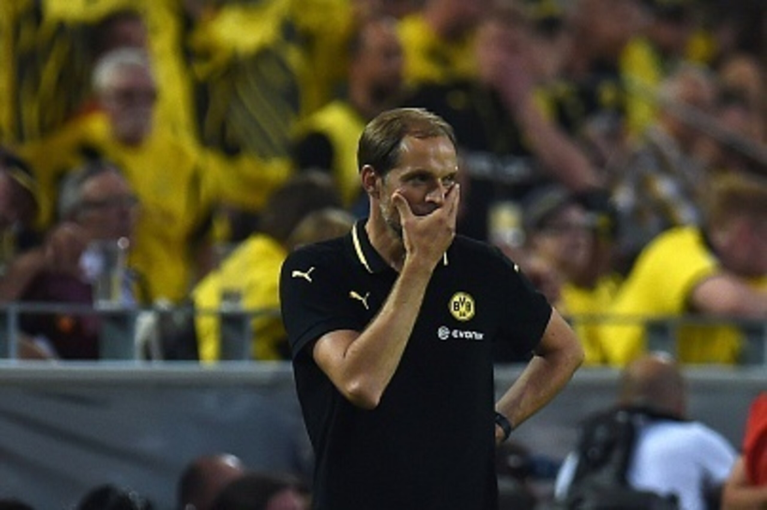 Dortmund's head coach Thomas Tuchel reacts during the UEFA Europa League third qualifying round second leg football match between  Borussia Dortmund and Wolfsberger AC on August 6, 2015 in Dortmund, western Germany. AFP PHOTO / PATRIK STOLLARZ        (Pho