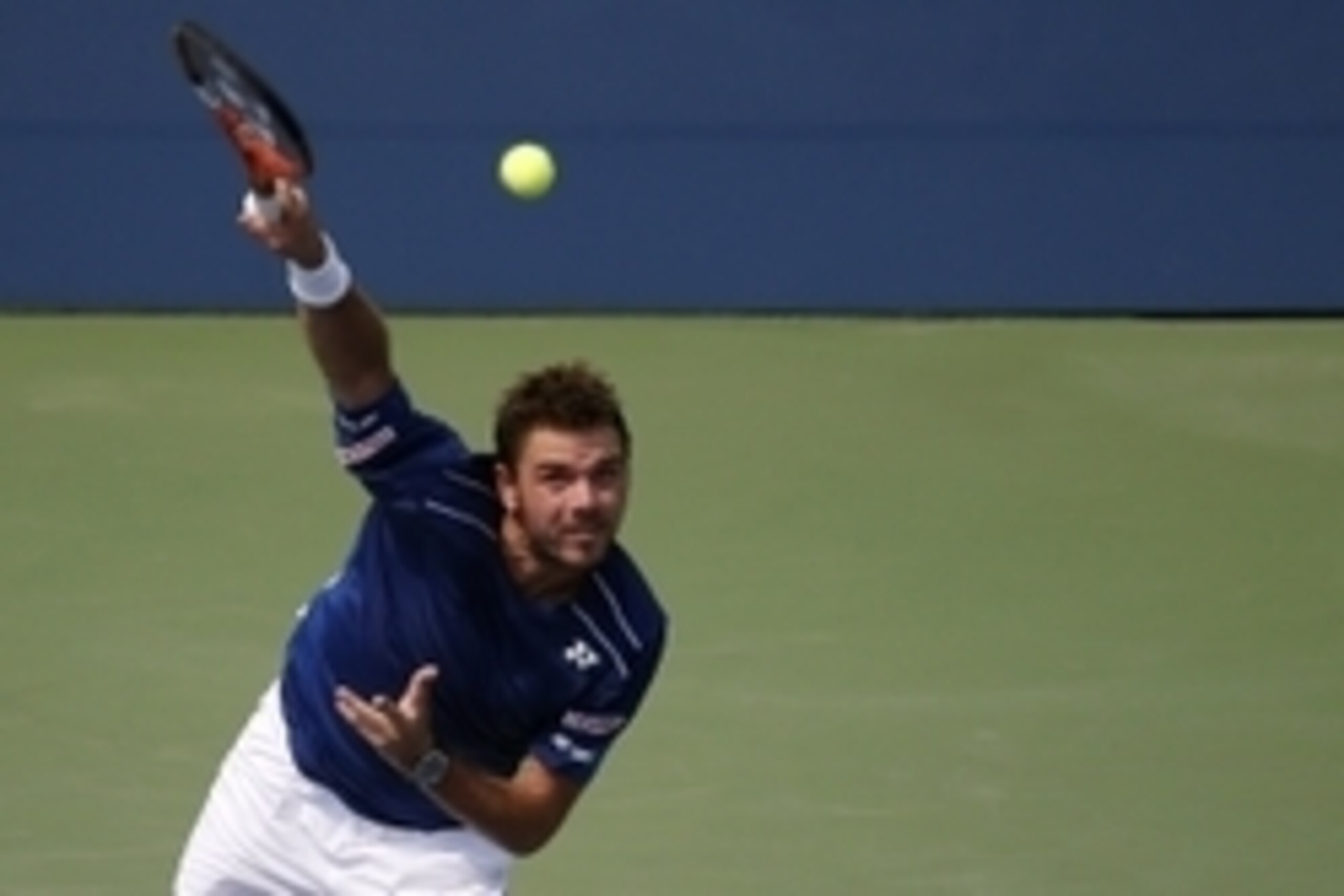 Sep 3, 2015; New York, NY, USA; Stan Wawrinka of Swizterland serves against Hyeon Chung of Korea (not pictured) on day four of the 2015 U.S. Open tennis tournament at USTA Billie Jean King National Tennis Center. Wawrinka won 7-6 (2), 7-6 (4), 7-6 (6). Ma