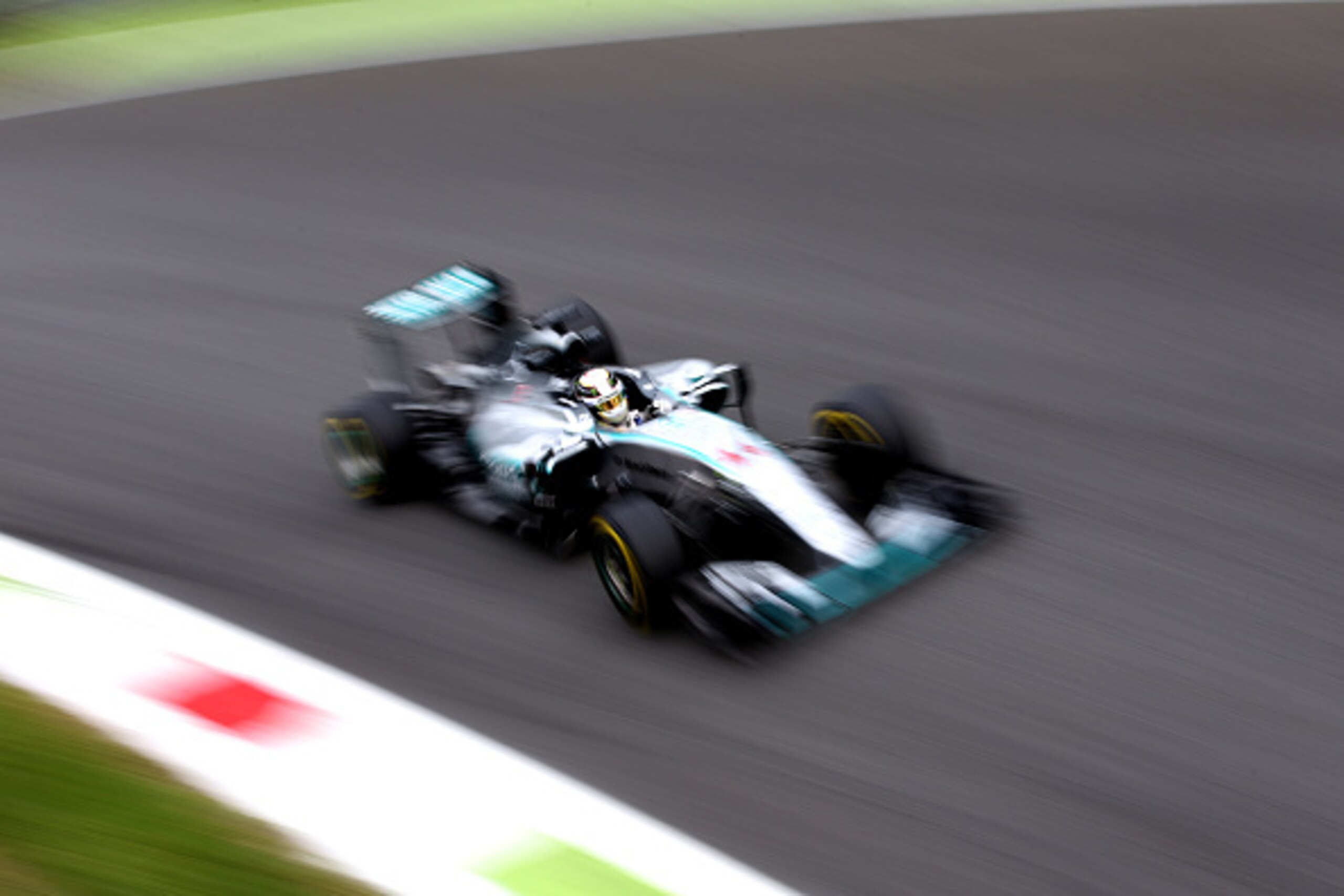 MONZA, ITALY - SEPTEMBER 04:  Lewis Hamilton of Great Britain and Mercedes GP drives during practice for the Formula One Grand Prix of Italy at Autodromo di Monza on September 4, 2015 in Monza, Italy.  (Photo by Mark Thompson/Getty Images)