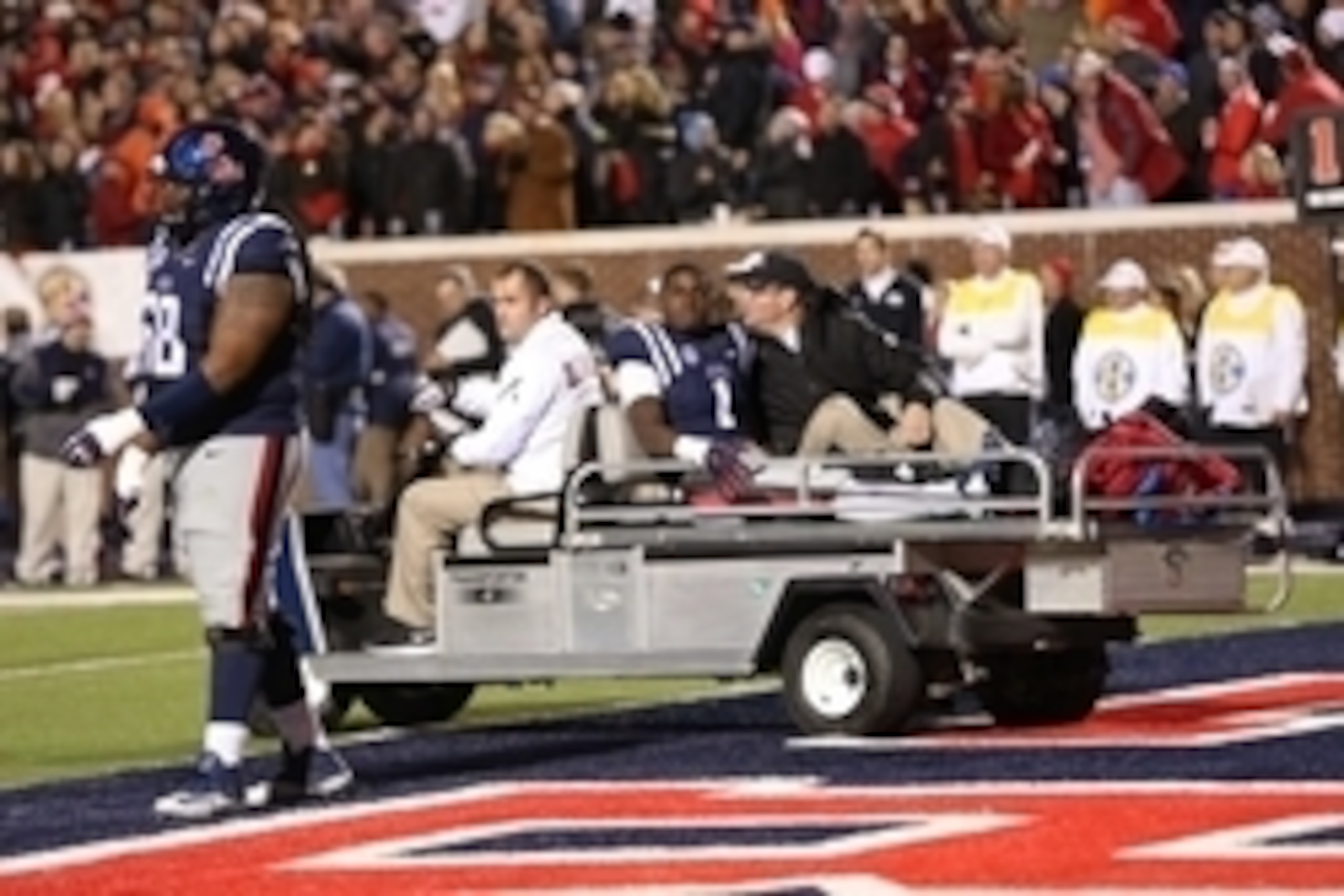 Nov 1, 2014; Oxford, MS, USA; Ole Miss Rebels wide receiver Laquon Treadwell (1) is carted off of the field after an injury on a play against the Auburn Tigers at Vaught-Hemingway Stadium. Auburn defeated Ole Miss 35-31. Mandatory Credit: Nelson Chenault-