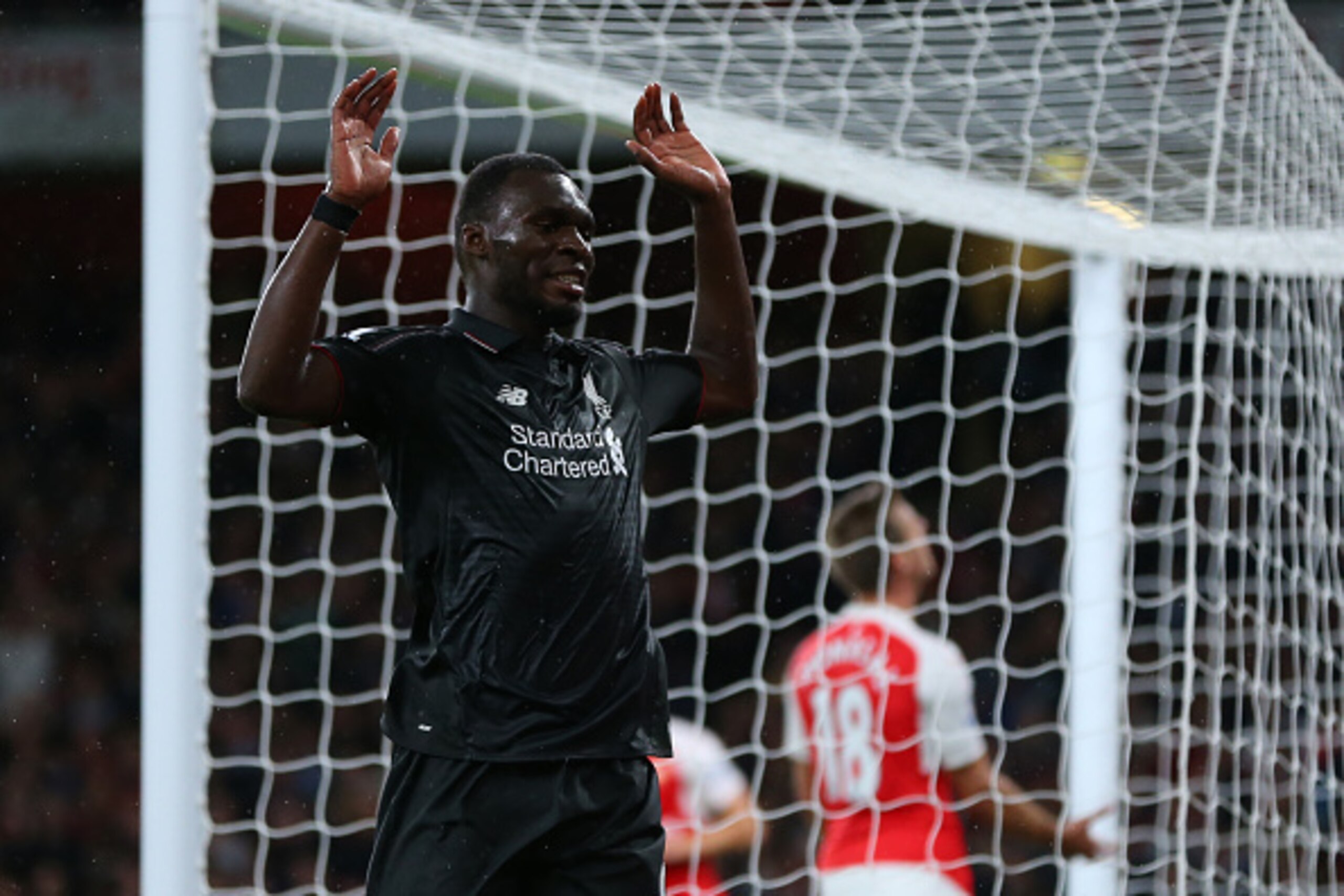 LONDON, ENGLAND - AUGUST 24:  Christian Benteke of Liverpool reacts after missing a chance to score during the Barclays Premier League match between Arsenal and Liverpool at the Emirates Stadium on August 24, 2015 in London, United Kingdom.  (Photo by Cat