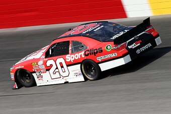 DARLINGTON, SC - SEPTEMBER 05:  Denny Hamlin, driver of the #20 Sport Clips Toyota, races the NASCAR XFINITY Series VFW Sport Clips Help A Hero 200 at Darlington Raceway on September 5, 2015 in Darlington, South Carolina.  (Photo by Matt Hazlett/Getty Ima
