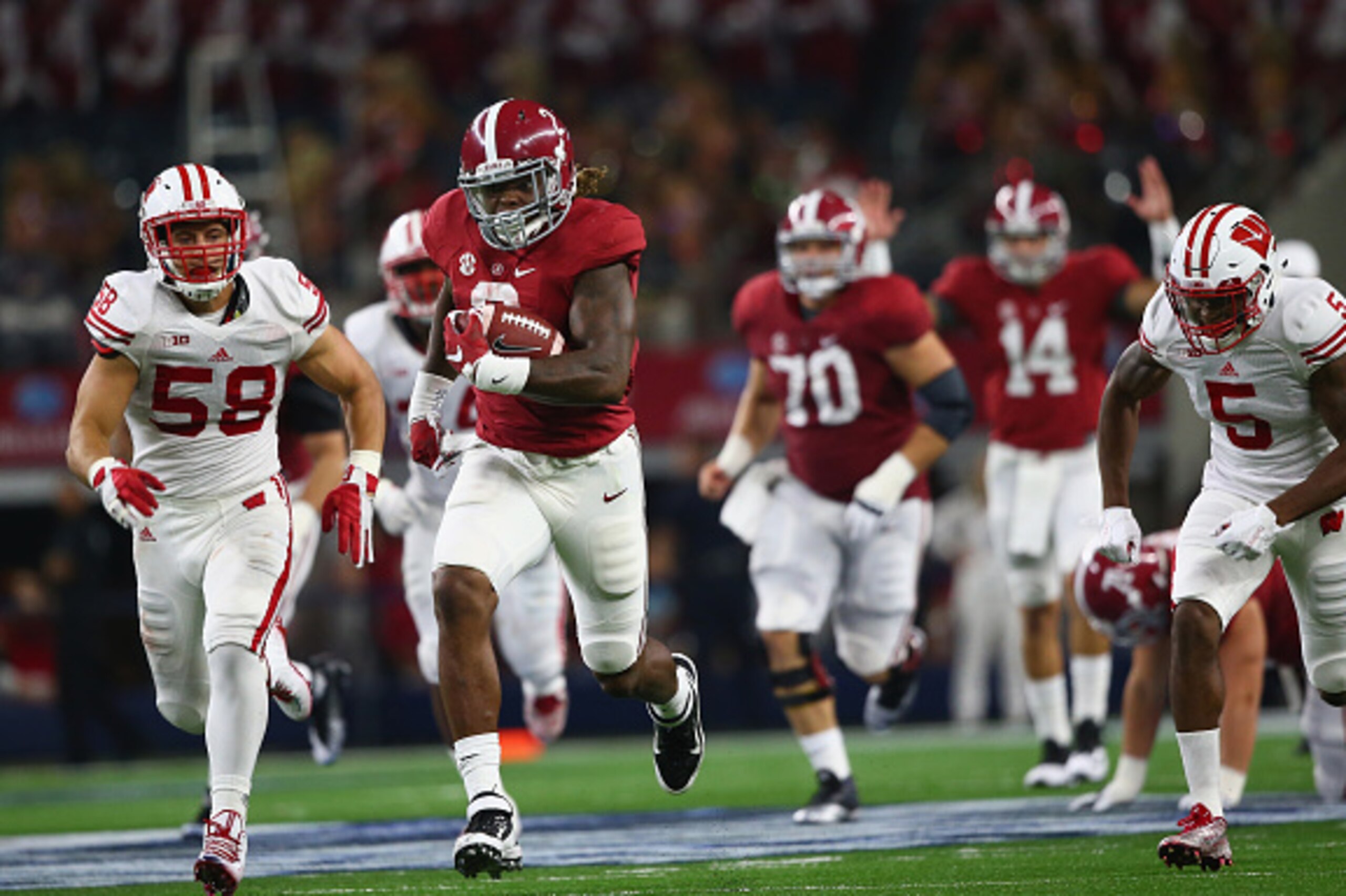 ARLINGTON, TX - SEPTEMBER 05: Derrick Henry #2 of the Alabama Crimson Tide runs for a touchdown against the Wisconsin Badgers in the third quarter during the Advocare Classic at AT&T Stadium on September 5, 2015 in Arlington, Texas. (Photo by Ronald Mar ARLINGTON, TX - SEPTEMBER 05: Derrick Henry #2 of the Alabama Crimson Tide runs for a touchdown against the Wisconsin Badgers in the third quarter during the Advocare Classic at AT&T Stadium on September 5, 2015 in Arlington, Texas. (Photo by Ronald Mar