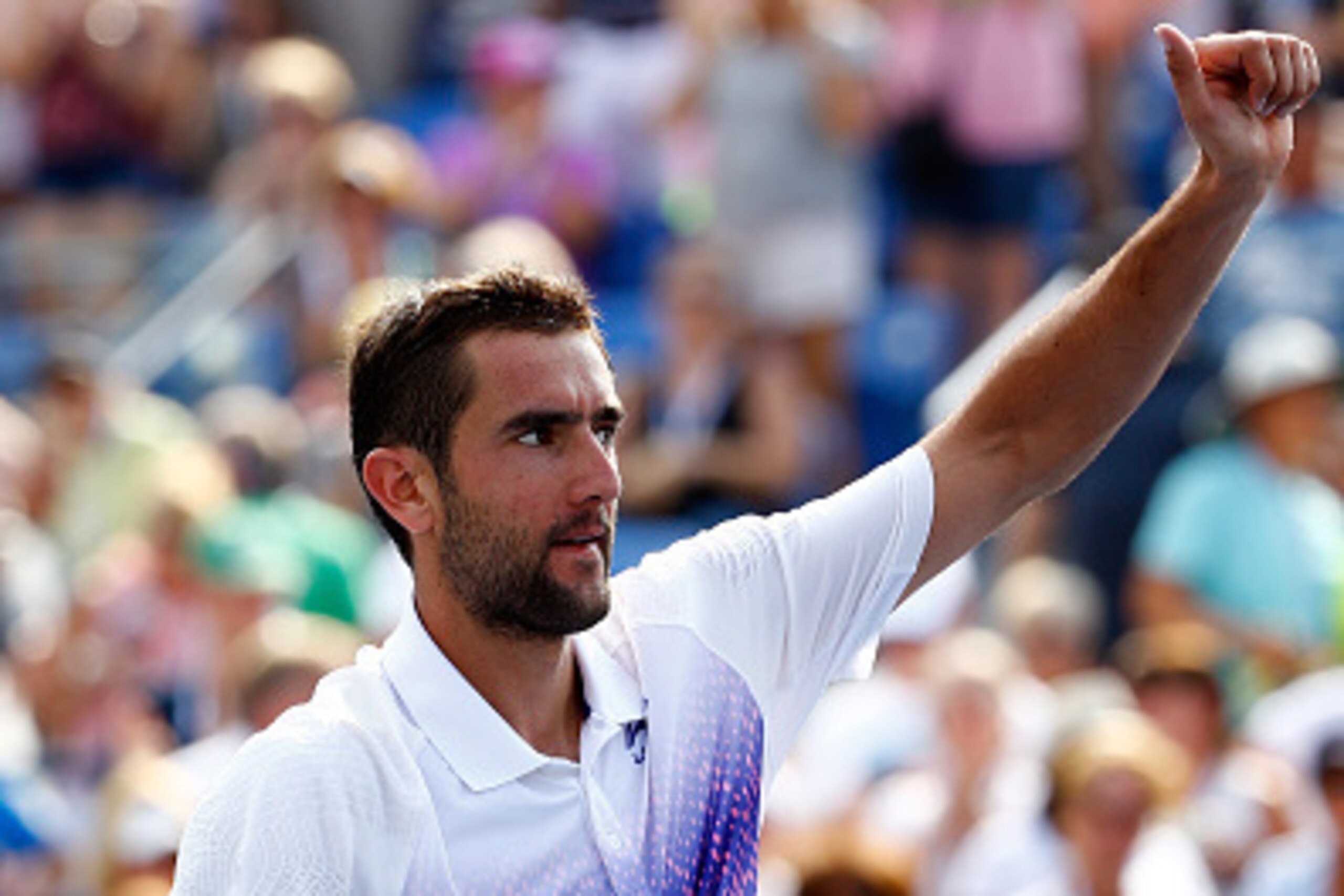 NEW YORK, NY - SEPTEMBER 04:  Marin Cilic of Croatia celebrates after defeating Mikhail Kukushkin of Kazakhstan in their Men's Singles Third Round match on Day Five of the 2015 US Open at the USTA Billie Jean King National Tennis Center on September 4, 20