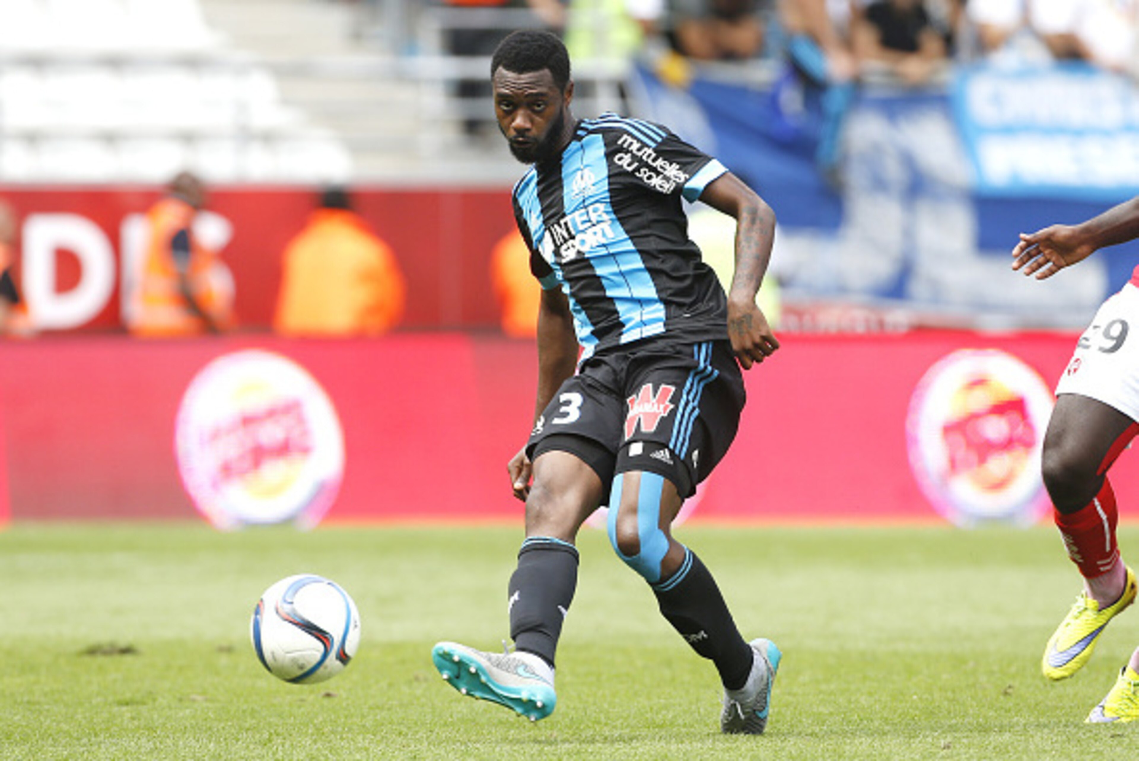 REIMS - AUGUST 16: Nicolas N'Koulou of OM in action during the French Ligue 1 match between Stade de Reims and Olympique de Marseille (OM) at Stade Auguste Delaune on August 16, 2015 in Reims, France. (Photo by Jean Catuffe/Getty Images)