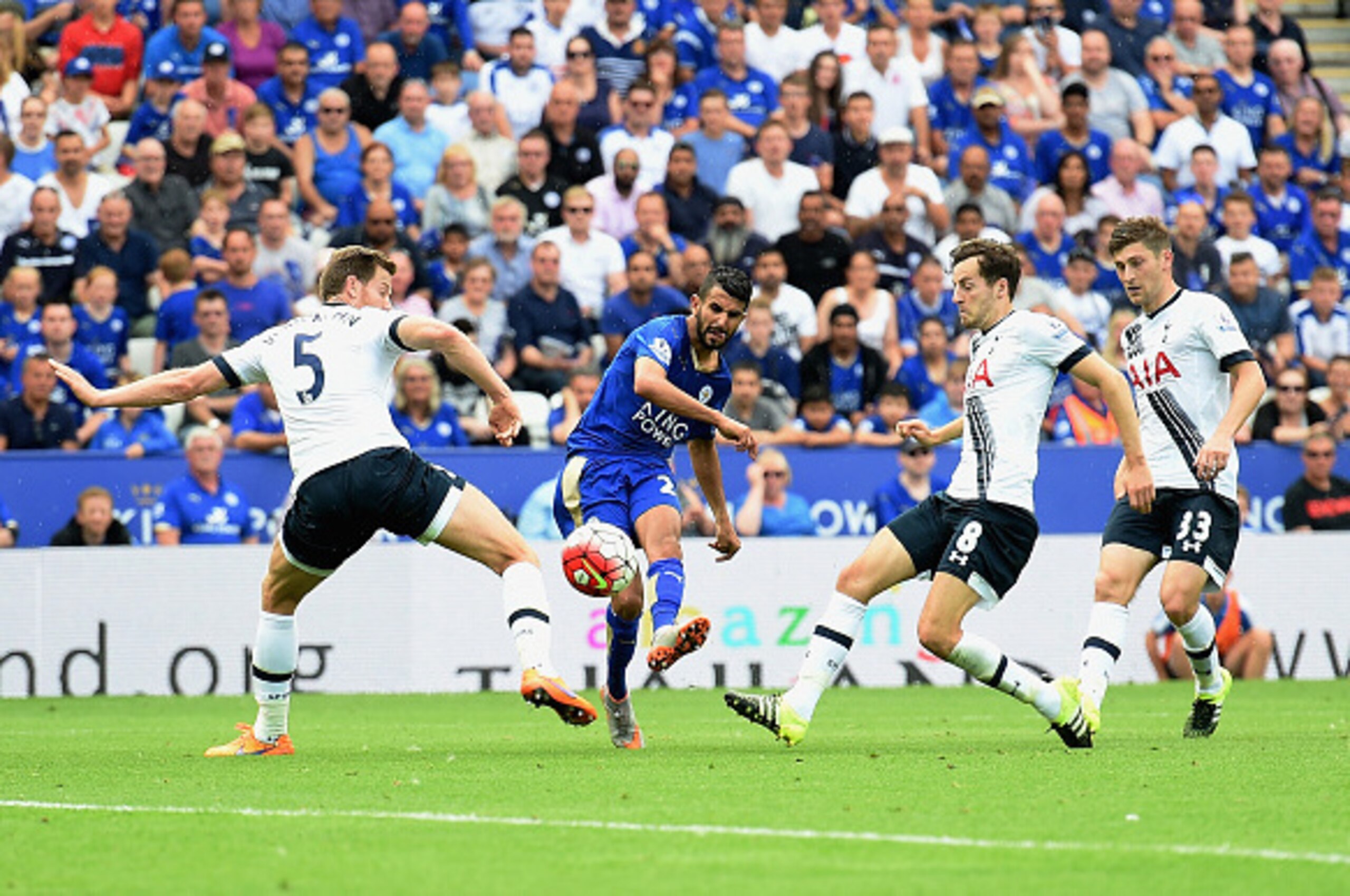 LEICESTER, ENGLAND - AUGUST 22:  Riyad Mahrez of Leicester City scores his team's first goal during the Barclays Premier League match between Leicester City and Tottenham Hotspur at The King Power Stadium on August 22, 2015 in Leicester, England.  (Photo 
