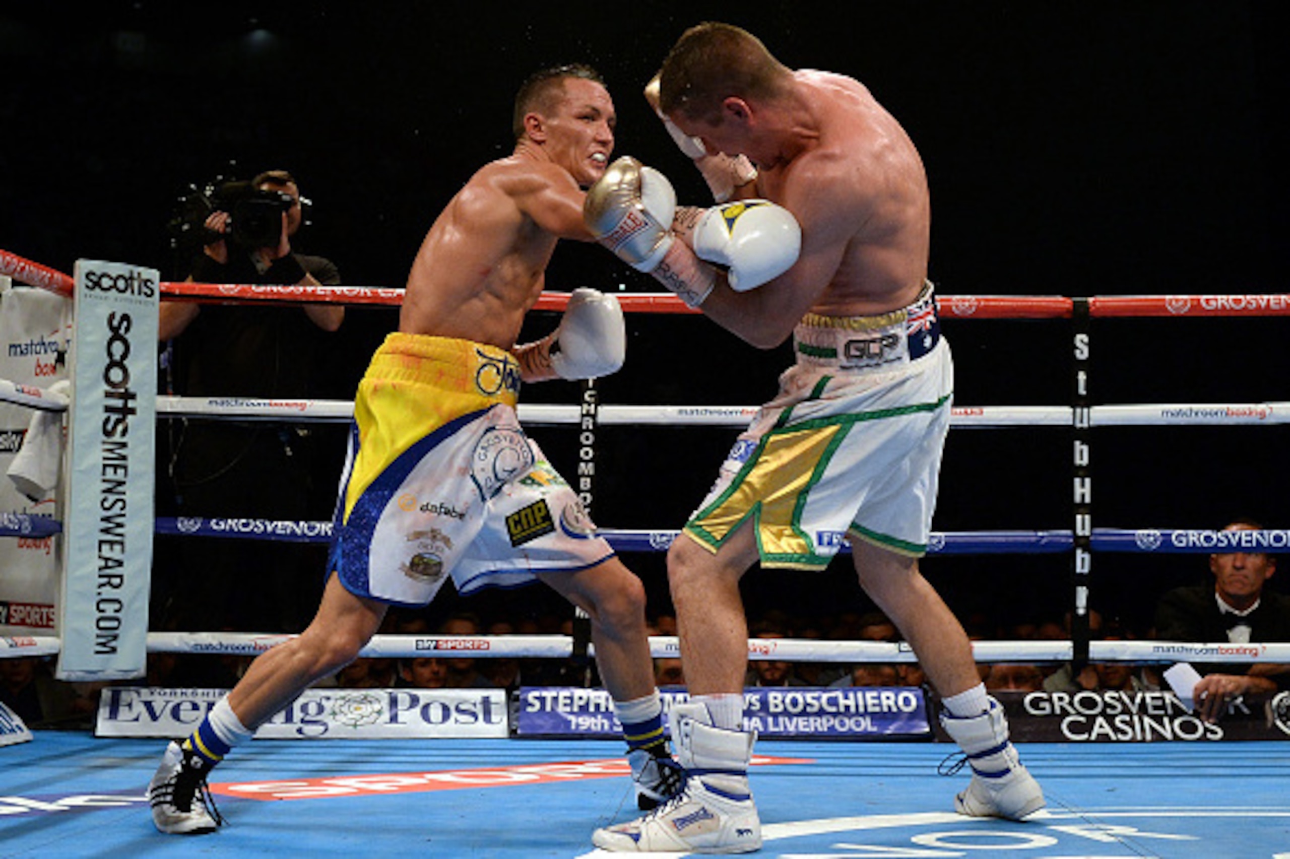 LEEDS, ENGLAND - SEPTEMBER 05:  Josh Warrington (L) in action against Joel Brunker during their Commonwealth and WBC International Featherweight title boxing contest at First Direct Arena on September 5, 2015 in Leeds, England.  (Photo by Nigel Roddis/Get