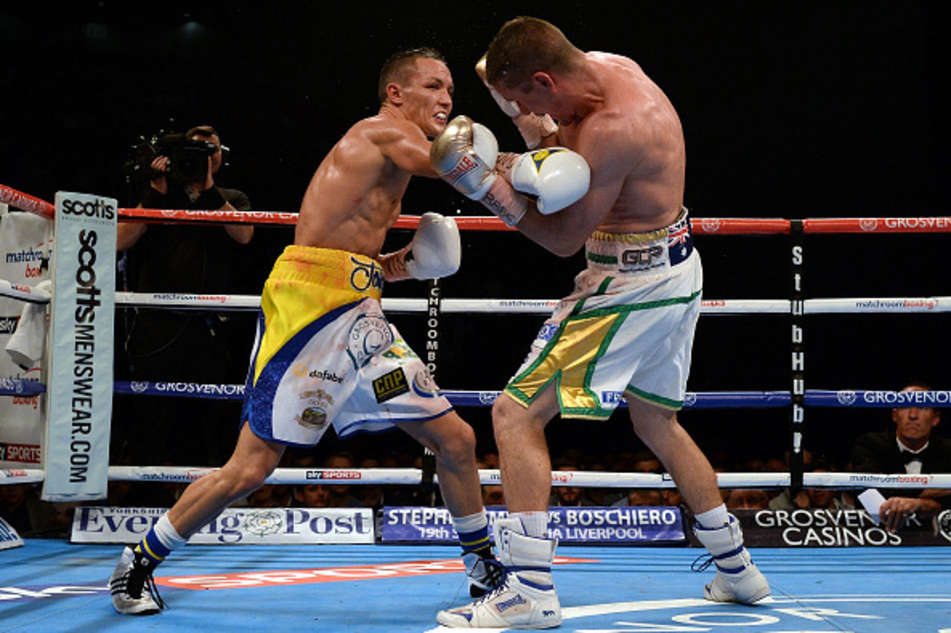 LEEDS, ENGLAND - SEPTEMBER 05:  Josh Warrington (L) in action against Joel Brunker during their Commonwealth and WBC International Featherweight title boxing contest at First Direct Arena on September 5, 2015 in Leeds, England.  (Photo by Nigel Roddis/Get