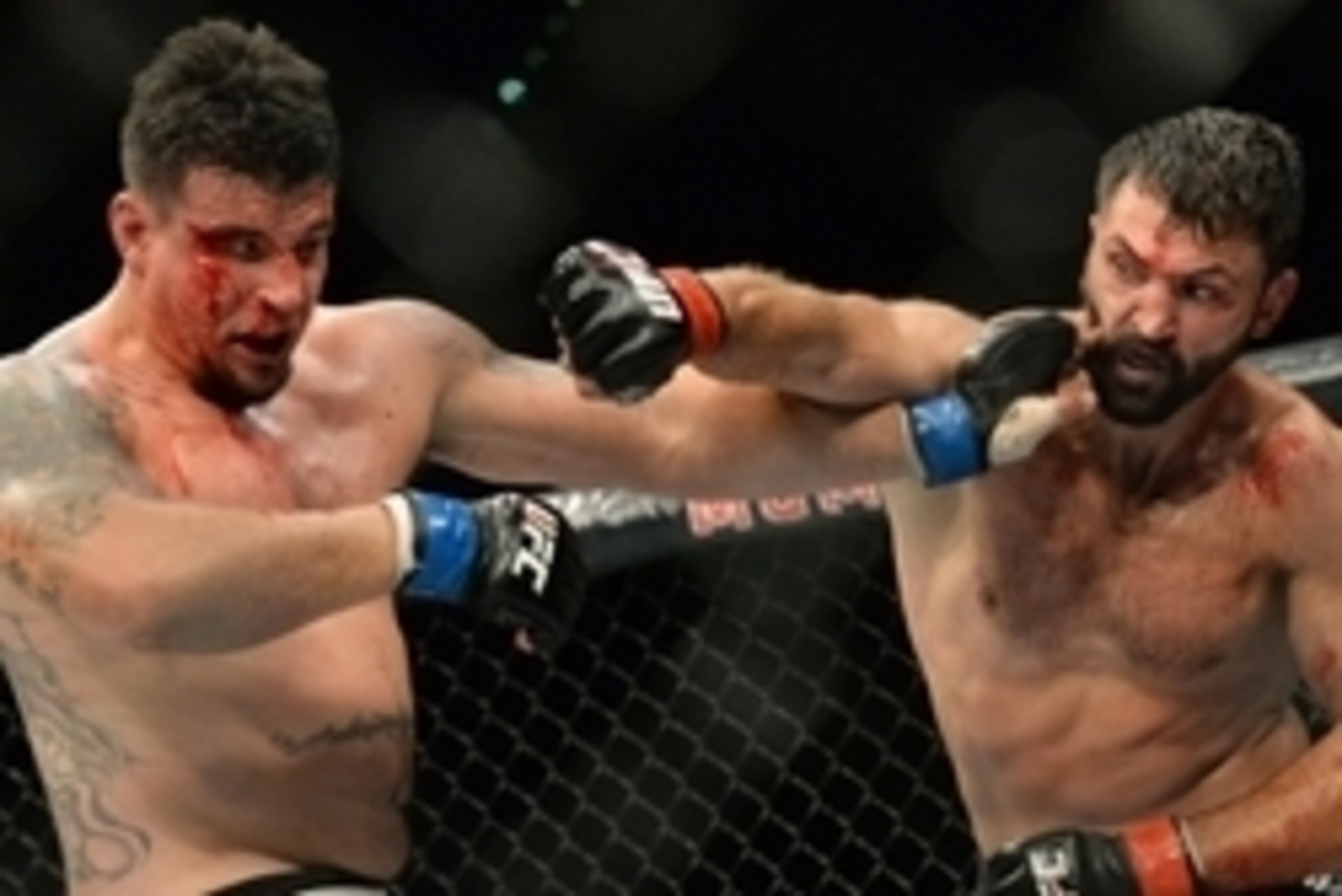 Sep 5, 2015; Las Vegas, NV, USA; Frank Mir (blue gloves) and Andrei Arlovski (red gloves) during their heavyweight bout at UFC 191 at MGM Grand Garden Arena. Mandatory Credit: Jayne Kamin-Oncea-USA TODAY Sports