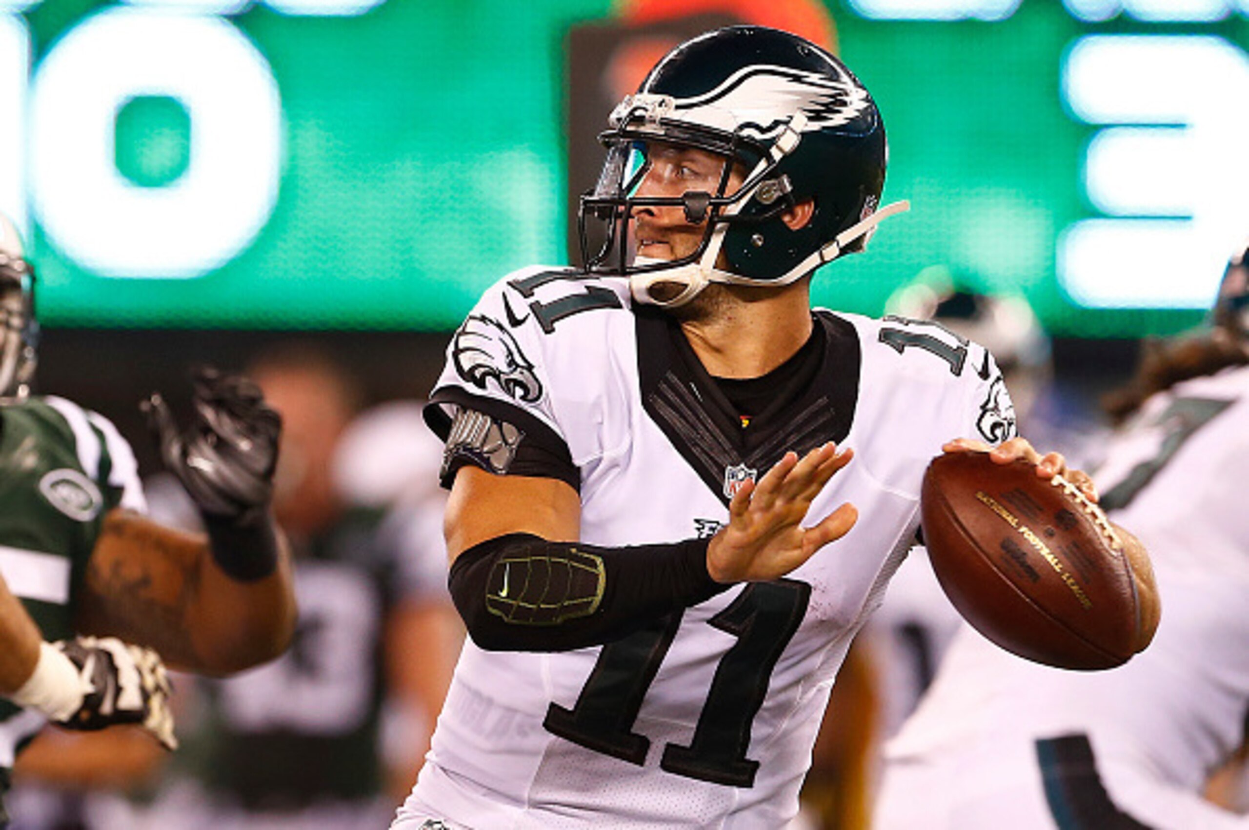 EAST RUTHERFORD, NJ - SEPTEMBER 03: Quarterback Tim Tebow #11 of the Philadelphia Eagles looks to pass against the New York Jets in the fourth quarter during a pre-season game at MetLife Stadium on September 3, 2015 in East Rutherford, New Jersey. (Photo 