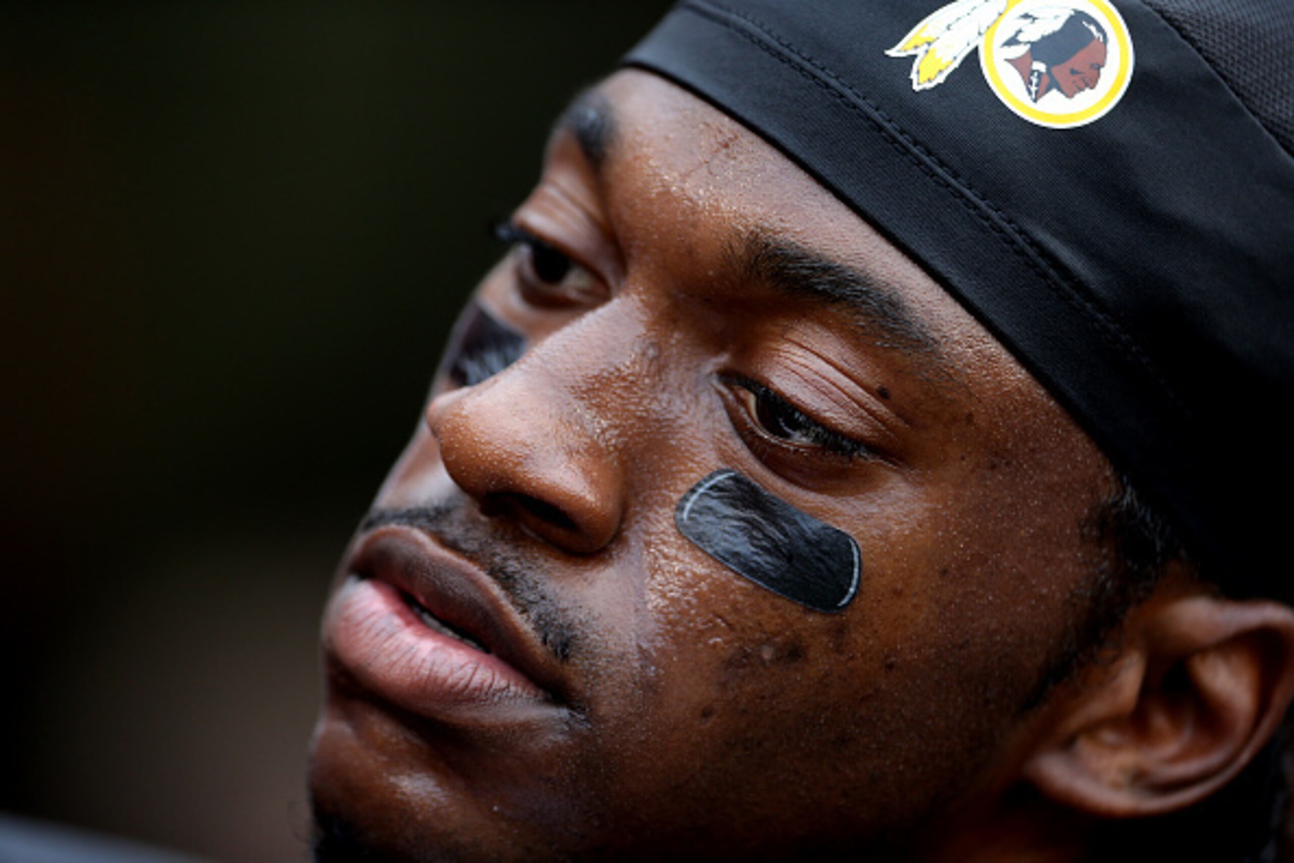 LANDOVER, MD - AUGUST 20: Quarterback Robert Griffin III #10 of the Washington Redskins looks on during warm ups prior to the start of a preseason game against the Detroit Lions at FedEx Field on August 20, 2015 in Landover, Maryland.  (Photo by Matt Hazl