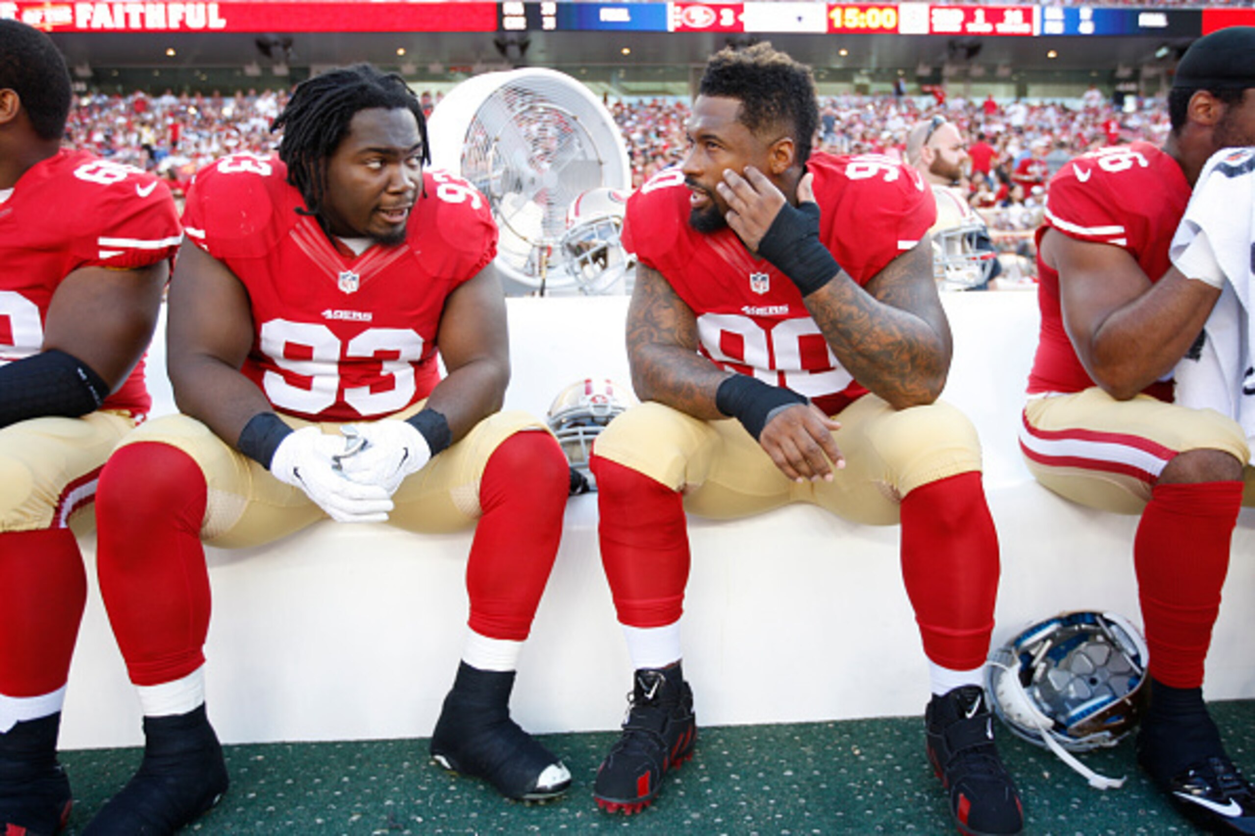 SANTA CLARA, CA - AUGUST 23: Ian Williams #93 and Darnell Dockett #90 of the San Francisco 49ers talk on the bench during the game against the Dallas Cowboys at Levi Stadium on August 23, 2015 in Santa Clara, California. The 49ers defeated the Cowboys 23- SANTA CLARA, CA - AUGUST 23: Ian Williams #93 and Darnell Dockett #90 of the San Francisco 49ers talk on the bench during the game against the Dallas Cowboys at Levi Stadium on August 23, 2015 in Santa Clara, California. The 49ers defeated the Cowboys 23-