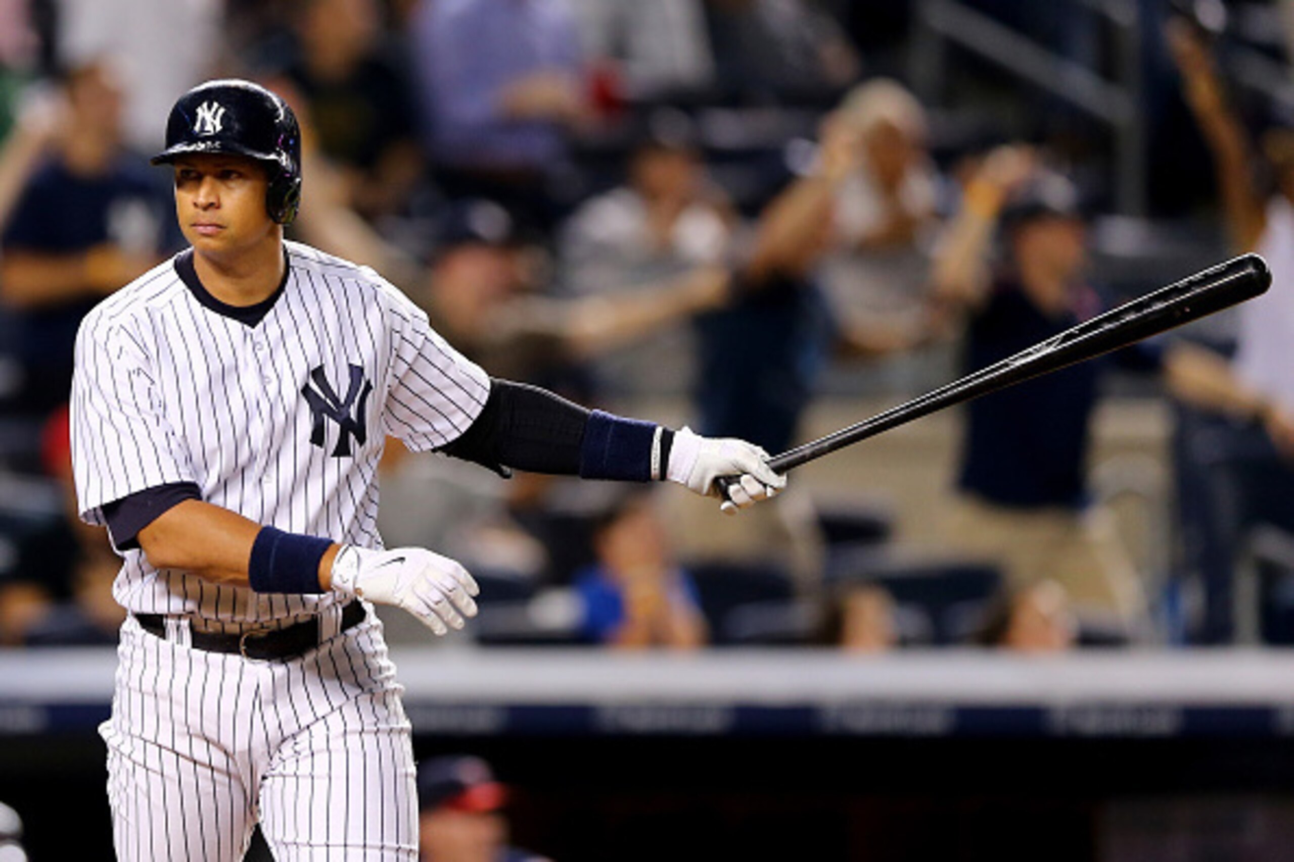 NEW YORK, NY - AUGUST 18:  Alex Rodriguez #13 of the New York Yankees celebrates his grand slam in the seventh inning against the Minnesota Twins on August 18, 2015 at Yankee Stadium in the Bronx borough of New York City.  (Photo by Elsa/Getty Images)