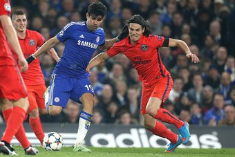 LONDON, ENGLAND - MARCH 11: Diego Costa of Chelsea and Edinson Cavani of PSG in action during the UEFA Champions League Round of 16, second leg match between Chelsea FC and Paris Saint-Germain FC at Stamford Bridge stadium on March 11, 2015 in London, Eng