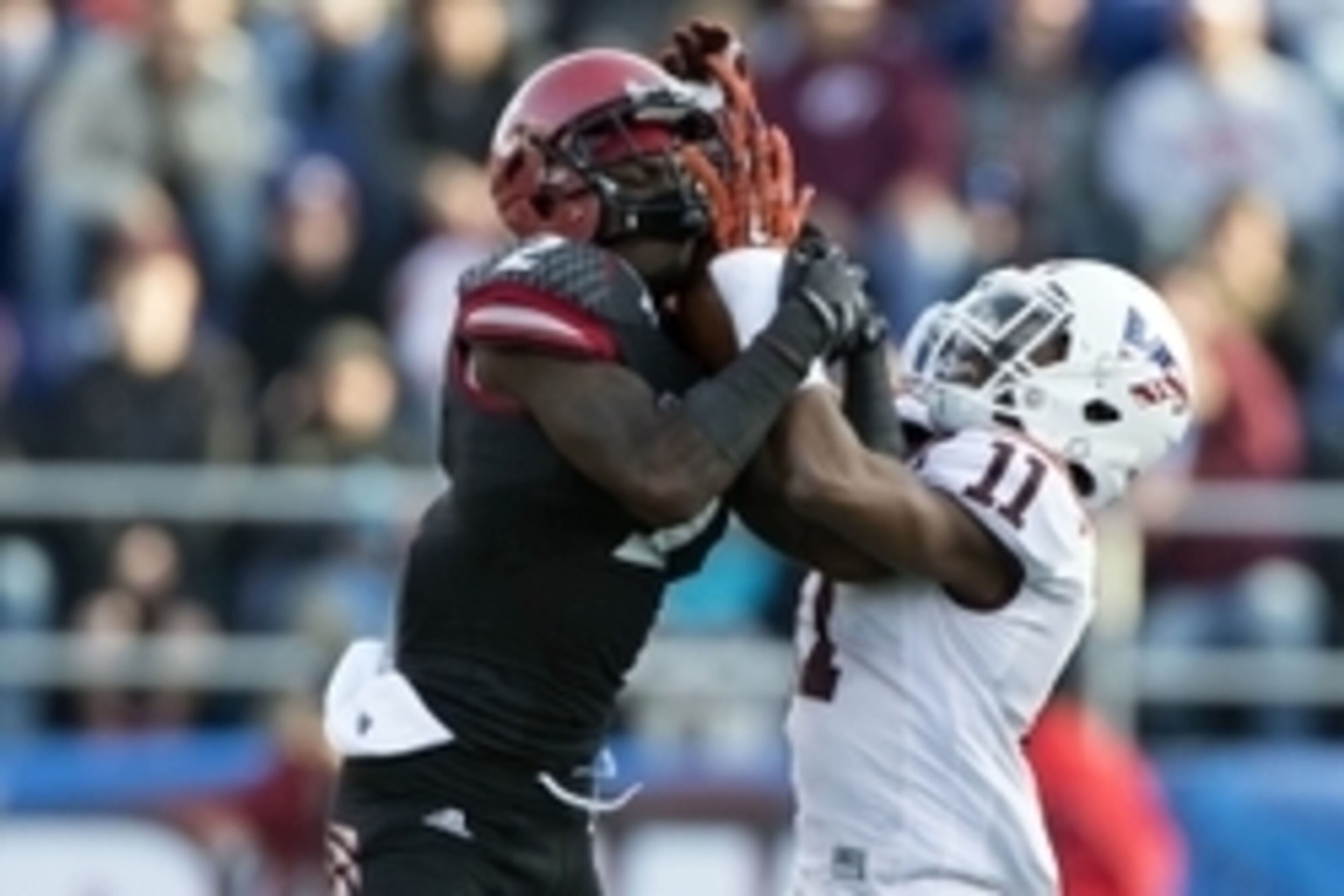 Dec 27, 2014; Annapolis, MD, USA; Cincinnati Bearcats wide receiver Mekale McKay (2) catches a passes as Virginia Tech Hokies cornerback Kendall Fuller (11) defends during the third quarter of the 2014 Military Bowl at Navy-Marine Corps Memorial Stadium. Dec 27, 2014; Annapolis, MD, USA; Cincinnati Bearcats wide receiver Mekale McKay (2) catches a passes as Virginia Tech Hokies cornerback Kendall Fuller (11) defends during the third quarter of the 2014 Military Bowl at Navy-Marine Corps Memorial Stadium.