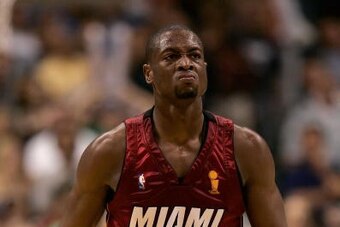 DALLAS - JUNE 20:  Dwyane Wade #3 of the Miami Heat reacts after a play in the third quarter against the Dallas Mavericks in game six of the 2006 NBA Finals on June 20, 2006 at American Airlines Center in Dallas, Texas.  NOTE TO USER: User expressly ackno