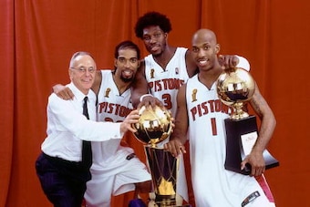 AUBURN HILLS, MI - JUNE 15:  (L-R) Head Coach Larry Brown, Richard Hamilton #32, Ben Wallace #3 and Chauncey Billups #1 of the Detroit Pistons pose for the photo shoot after the win over the Los Angeles Lakers in game five of the 2004 NBA Finals at The Pa