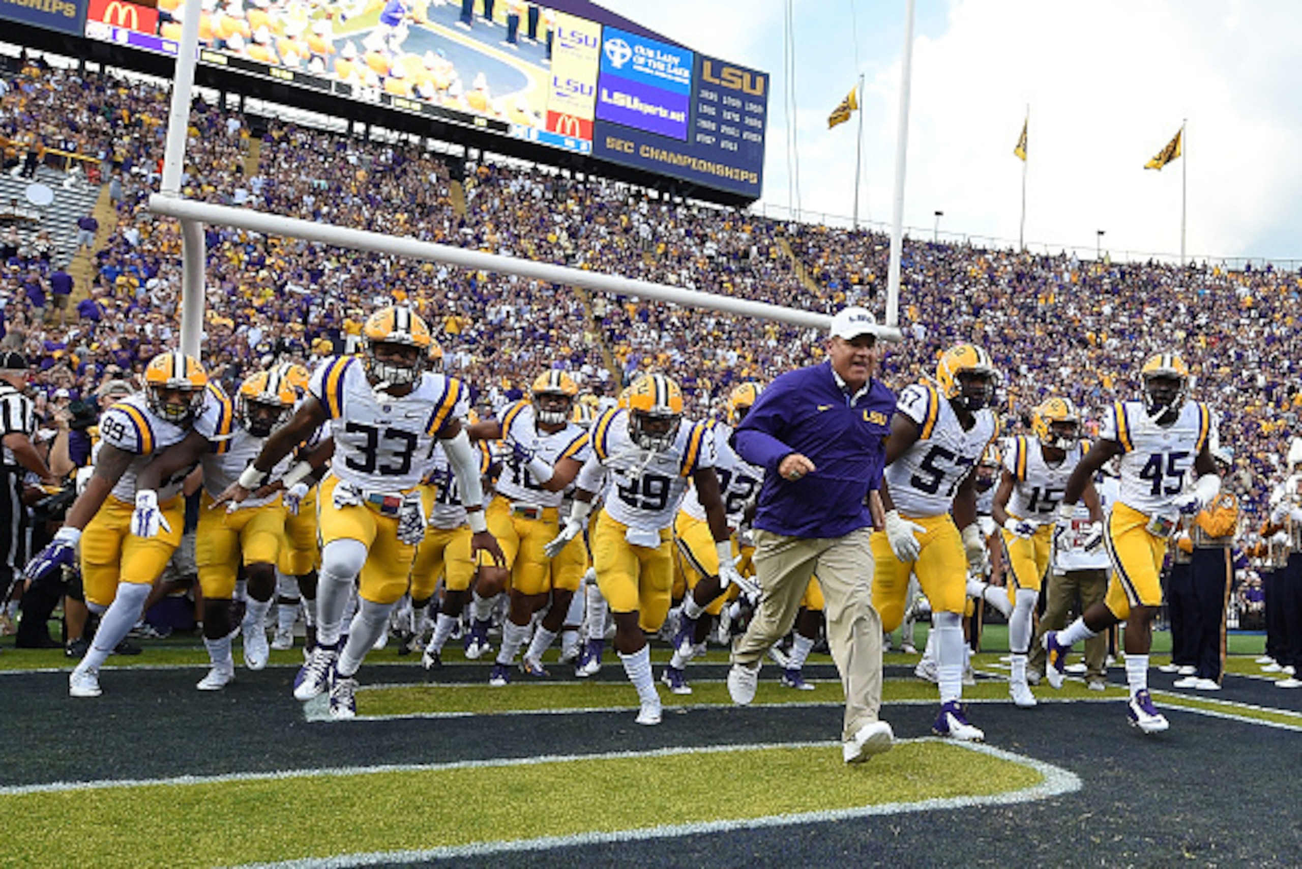 BATON ROUGE, LA - SEPTEMBER 05:  Head coach Les Miles of the LSU Tigers leads his team onto the field prior to a game against the McNeese State Cowboys at Tiger Stadium on September 5, 2015 in Baton Rouge, Louisiana.  (Photo by Stacy Revere/Getty Images)