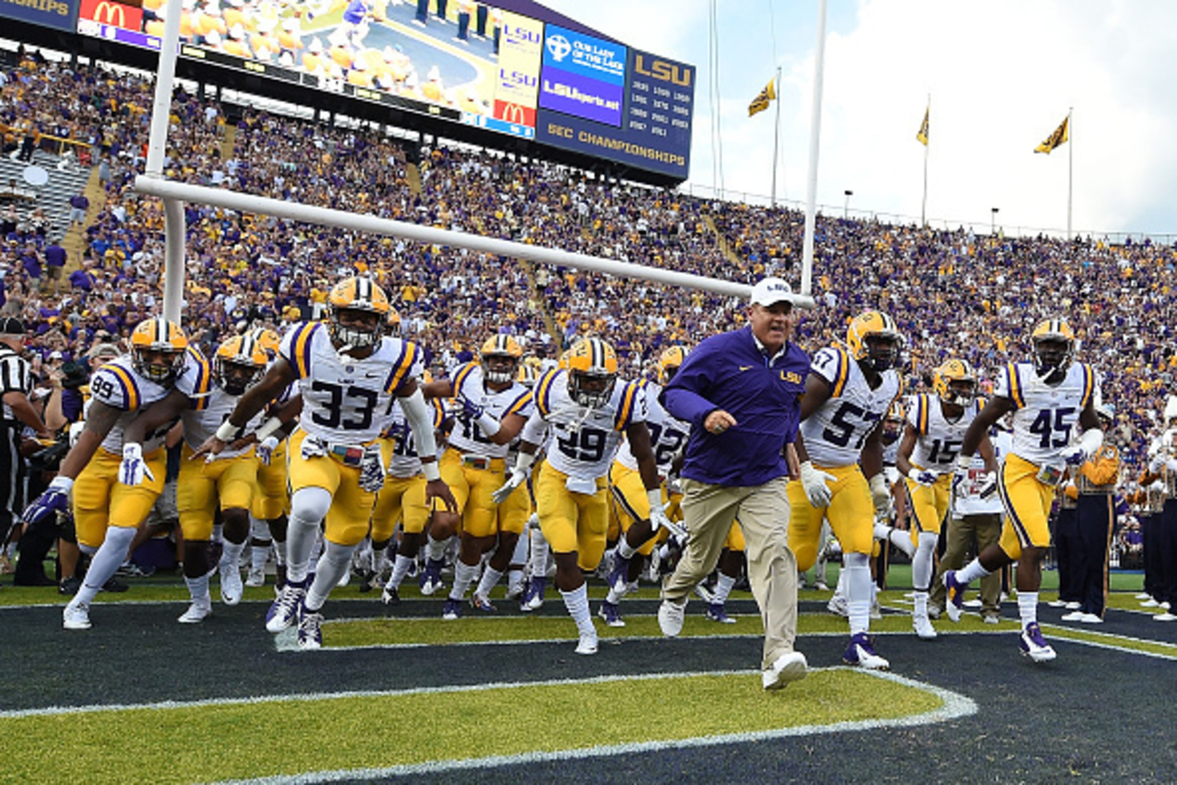 BATON ROUGE, LA - SEPTEMBER 05:  Head coach Les Miles of the LSU Tigers leads his team onto the field prior to a game against the McNeese State Cowboys at Tiger Stadium on September 5, 2015 in Baton Rouge, Louisiana.  (Photo by Stacy Revere/Getty Images)