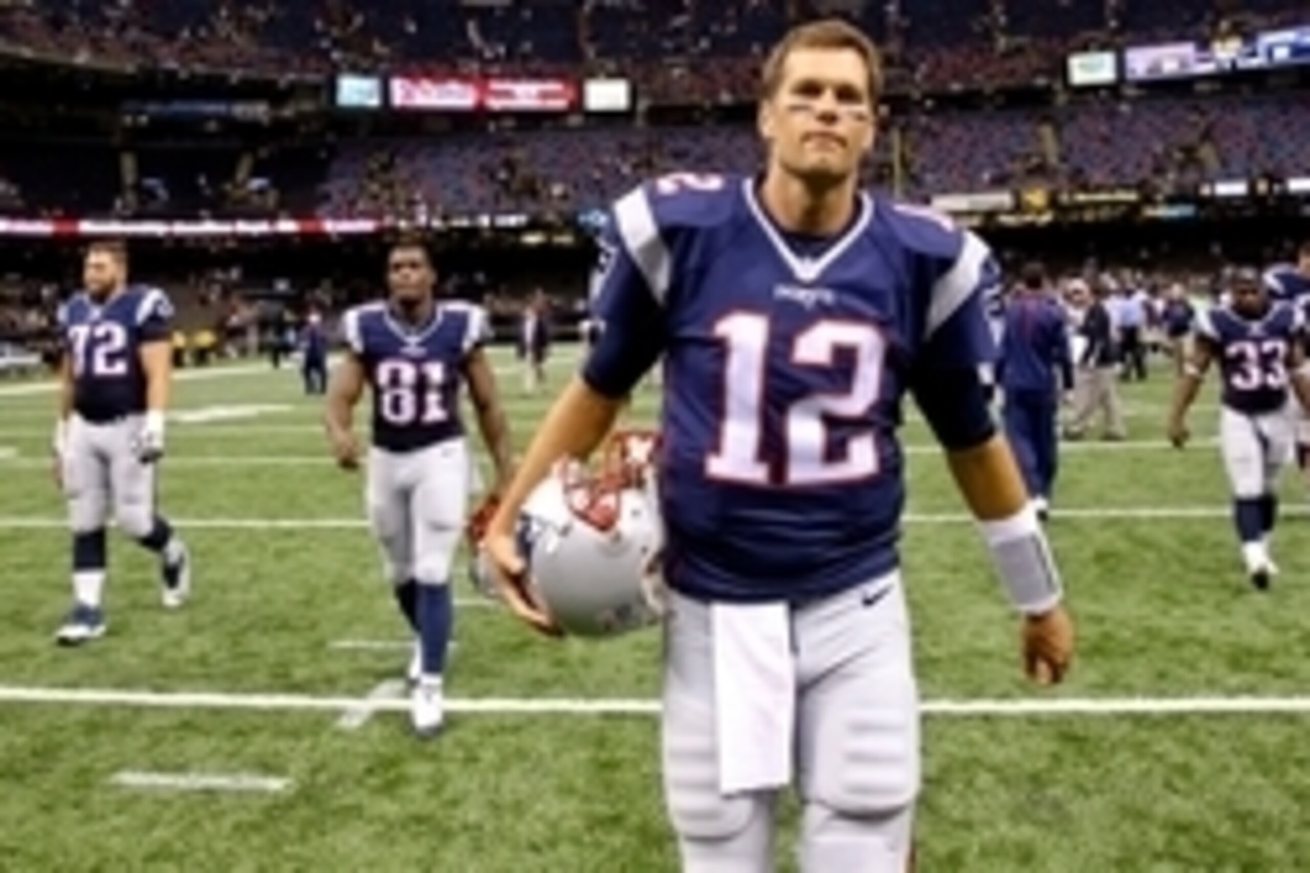 Aug 22, 2015; New Orleans, LA, USA; New England Patriots quarterback Tom Brady (12) walks off the field after a preseason game against the New Orleans Saints at the Mercedes-Benz Superdome. The Patriots defeated the Saints 26-24. Mandatory Credit: Derick 
