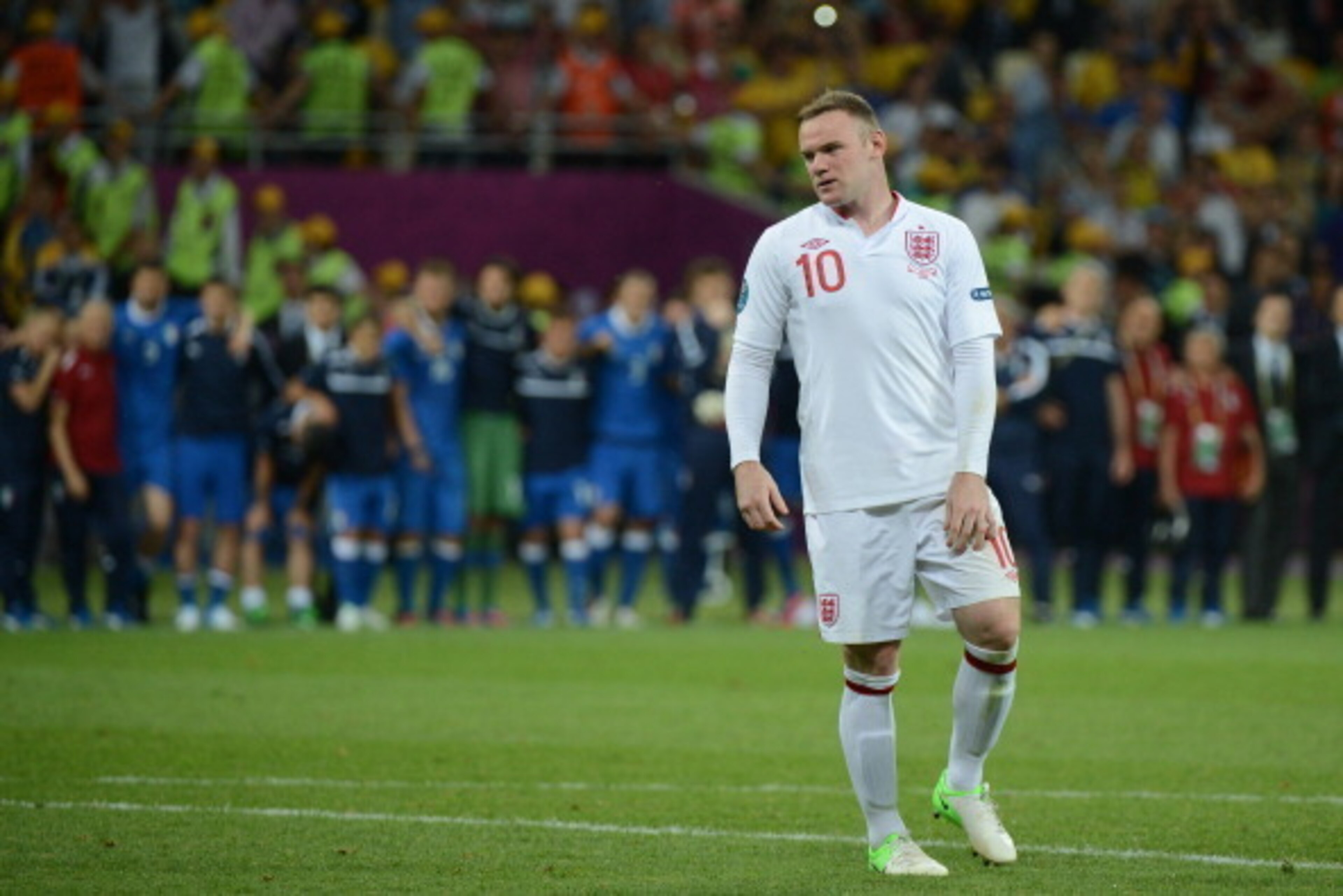 English forward Wayne Rooney is pictured after kicking a penalty during a penalty shoot out at the Euro 2012 football championships quarter-final match England vs Italy on June 24, 2012 at the Olympic Stadium in Kiev.  AFP PHOTO / DAMIEN MEYER        (Pho