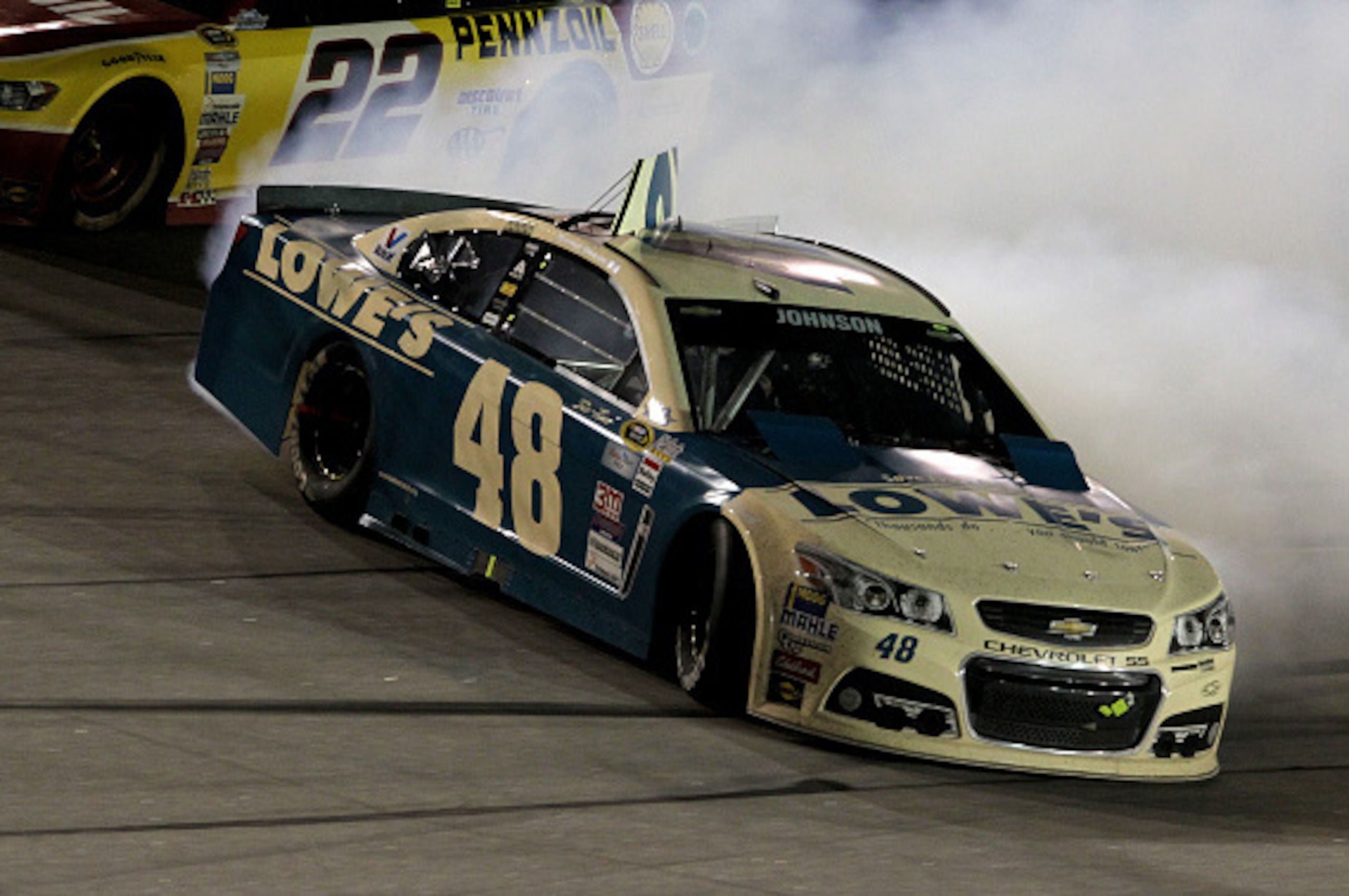DARLINGTON, SC - SEPTEMBER 06:  Jimmie Johnson, driver of the #48 Lowe's Chevrolet, spins on track during the NASCAR Sprint Cup Series Bojangles' Southern 500 at Darlington Raceway on September 6, 2015 in Darlington, South Carolina.  (Photo by Kena Krutsi