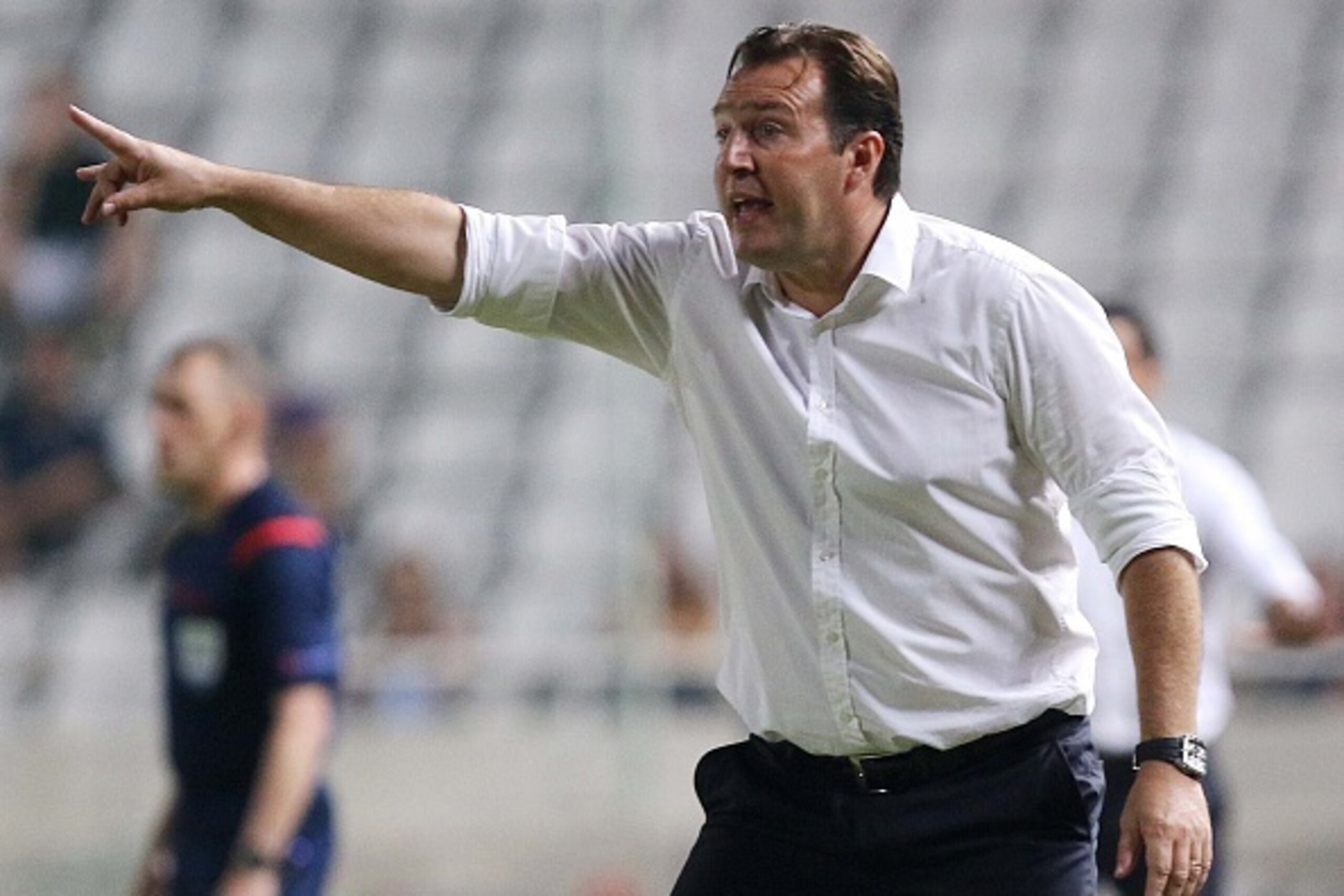 Belgium's coach Marc Wilmots reacts during his team's EURO 2016 qualifier football match between Cyprus and Belgium at the Neo GSP stadium in the Cypriot capital, Nicosia, on September 6, 2015. AFP PHOTO / SAKIS SAVVIDES        (Photo credit should read S