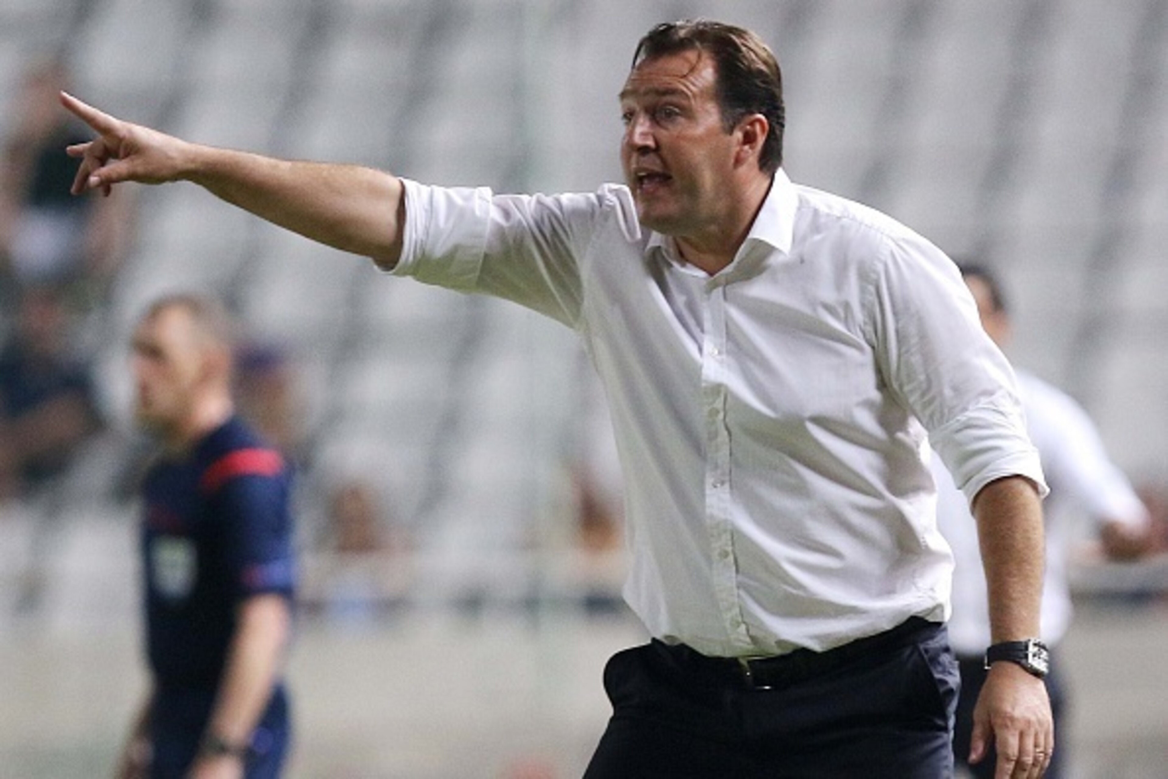 Belgium's coach Marc Wilmots reacts during his team's EURO 2016 qualifier football match between Cyprus and Belgium at the Neo GSP stadium in the Cypriot capital, Nicosia, on September 6, 2015. AFP PHOTO / SAKIS SAVVIDES        (Photo credit should read S