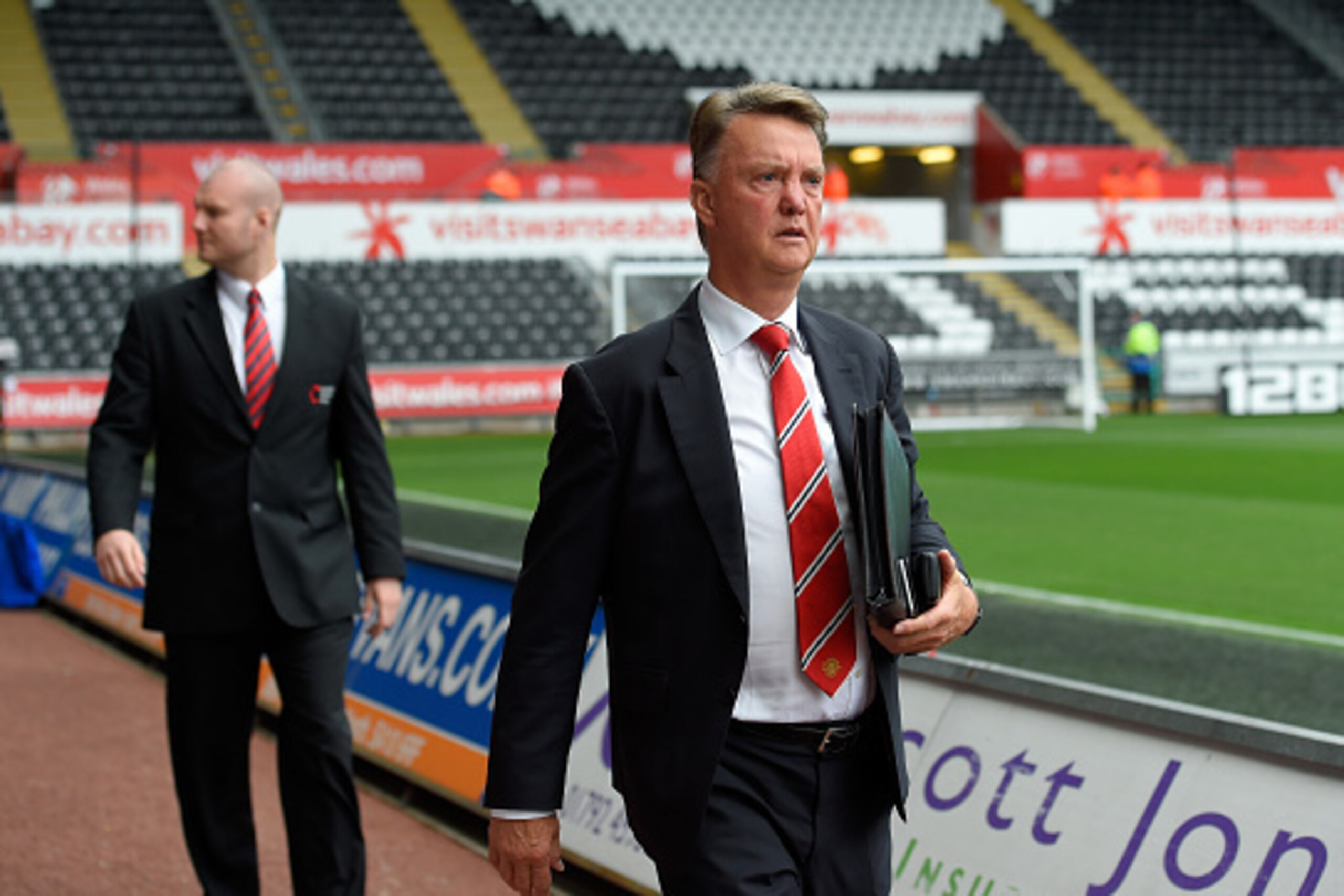 SWANSEA, WALES - AUGUST 30:  Manchester United manager Louis van Gaal  makes his way into the stadium before the Barclays Premier League match between Swansea City and Manchester United on August 30, 2015 in Swansea, United Kingdom.  (Photo by Stu Forster