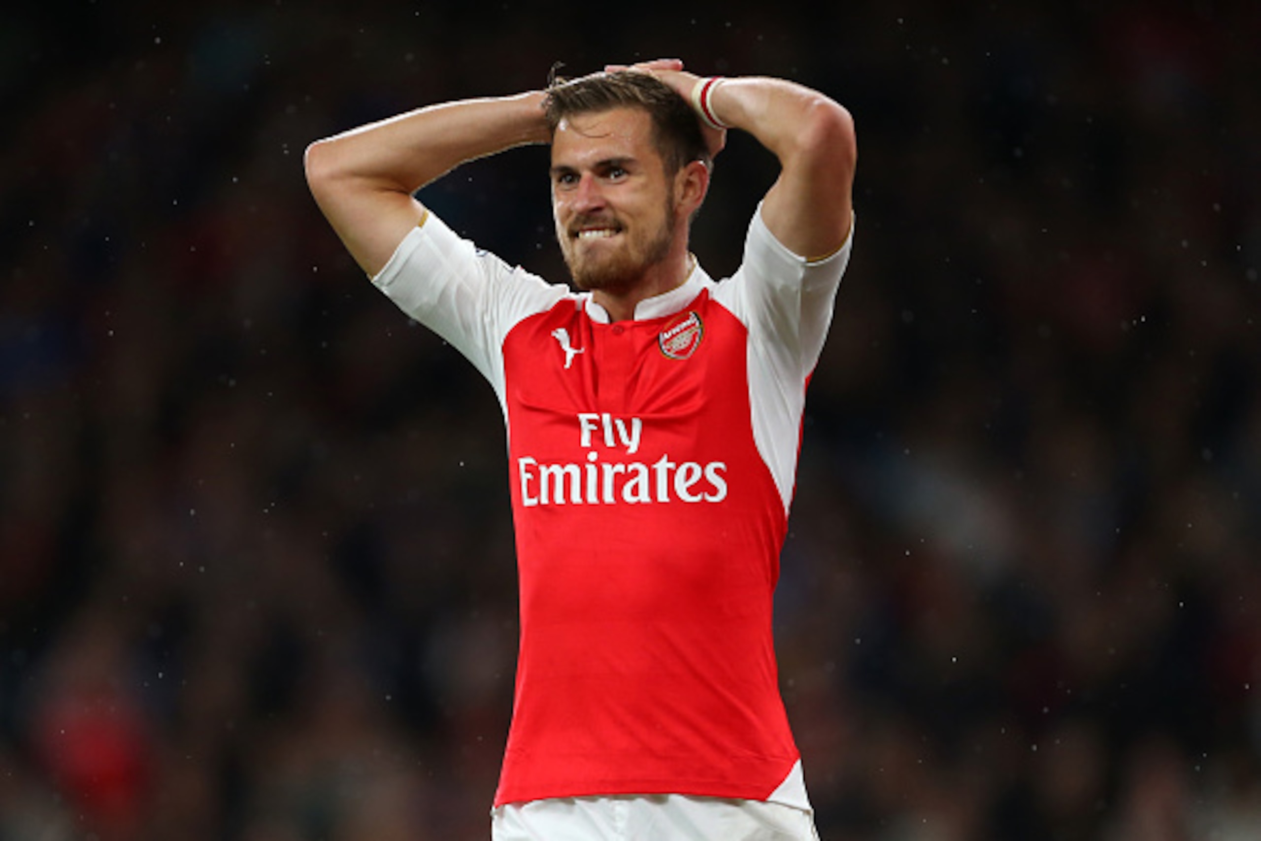 LONDON, ENGLAND - AUGUST 24: Aaron Ramsey of Arsenal reacts during the Barclays Premier League match between Arsenal and Liverpool at the Emirates Stadium on August 24, 2015 in London, United Kingdom. (Photo by Catherine Ivill - AMA/Getty Images) LONDON, ENGLAND - AUGUST 24: Aaron Ramsey of Arsenal reacts during the Barclays Premier League match between Arsenal and Liverpool at the Emirates Stadium on August 24, 2015 in London, United Kingdom. (Photo by Catherine Ivill - AMA/Getty Images)