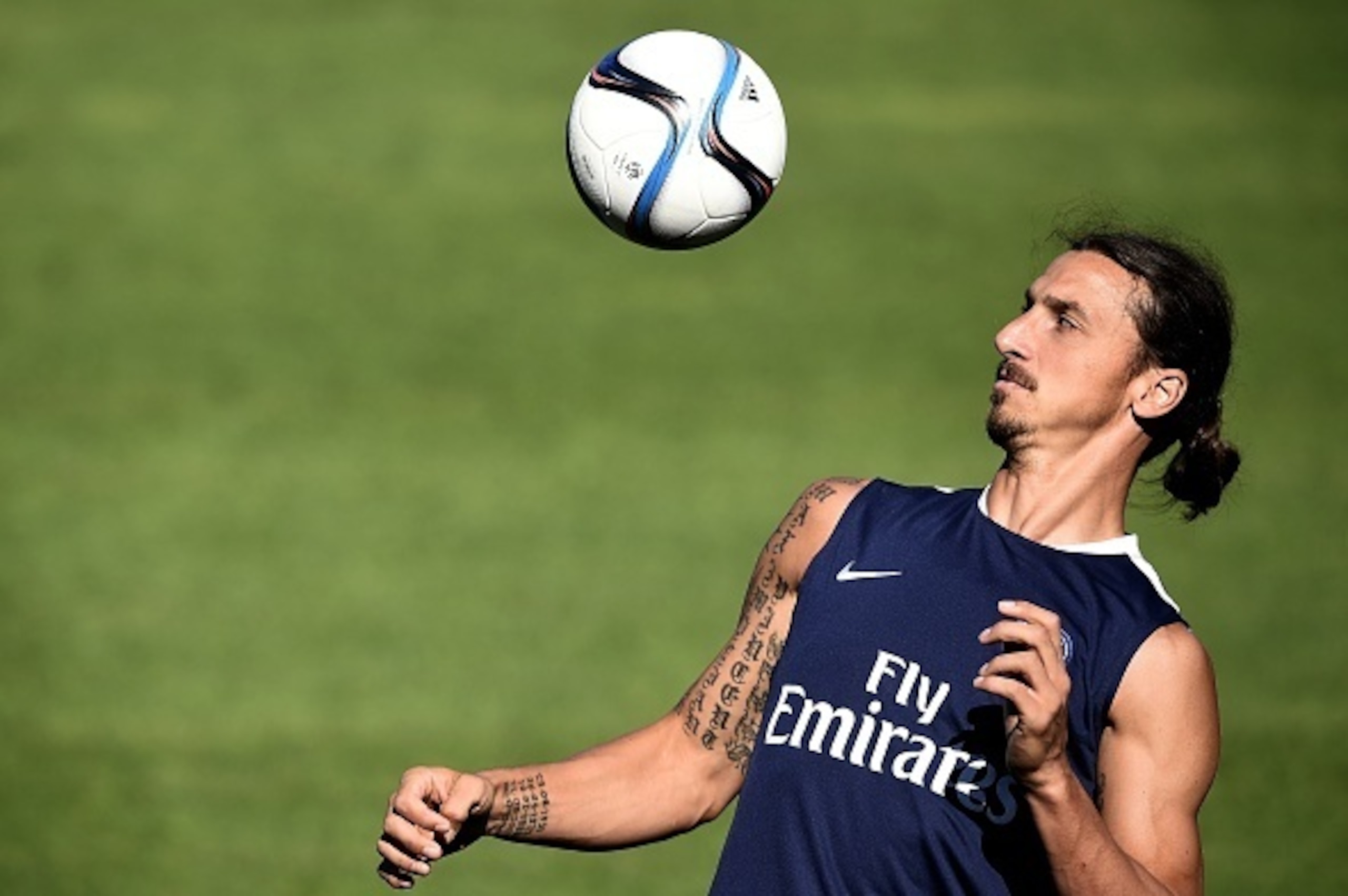 Paris Saint-Germain's Swedish forward Zlatan Ibrahimovic eyes the ball during a training session at Saputo stadium in Montreal on July 31, 2015 on the eve of the French Trophy of Champions football match against Lyon.  AFP PHOTO / FRANCK FIFE        (Phot