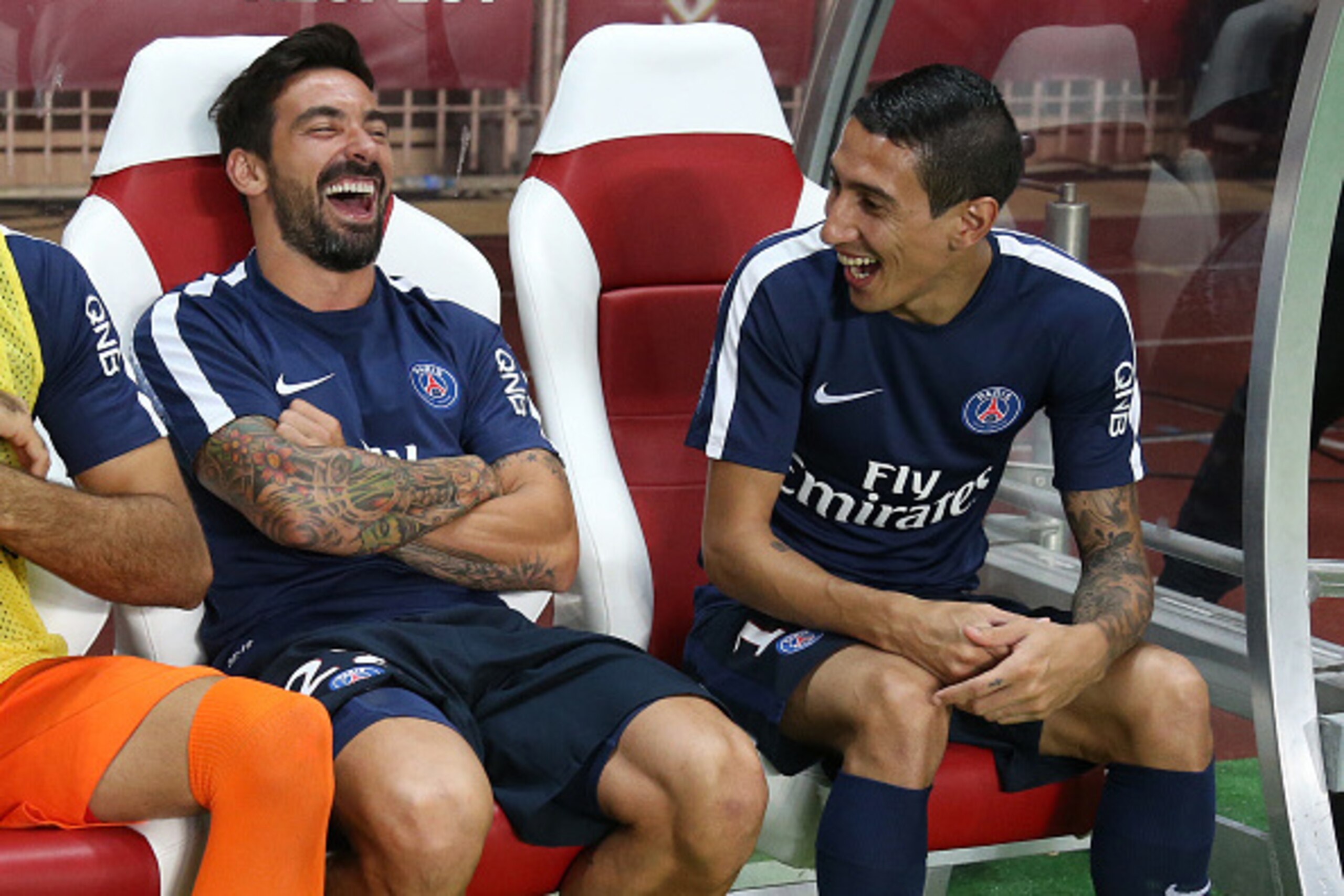 MONACO - AUGUST 30: Ezequiel Lavezzi and Angel Di Maria of PSG joke during the French Ligue 1 match between AS Monaco and Paris Saint-Germain at Stade Louis II on August 30, 2015 in Monaco. (Photo by Jean Catuffe/Getty Images)