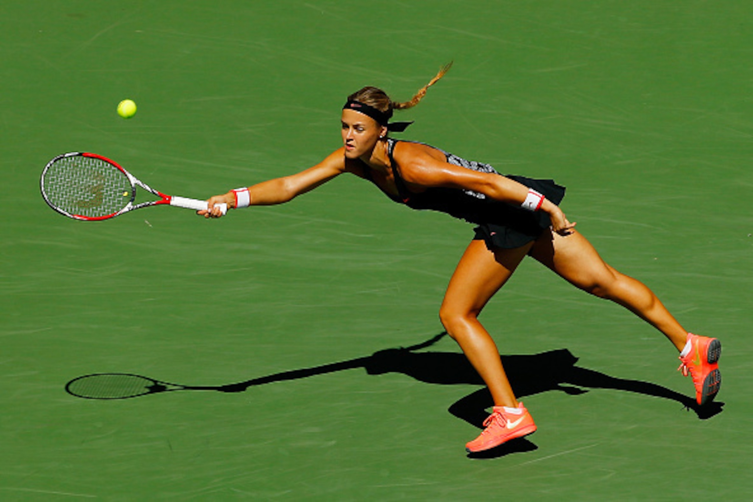 NEW YORK, NY - SEPTEMBER 05: Anna Karolina Schmiedlova of Slovakia returns a shot to Petra Kvitova of the Czech Republic during their Women's Singles Third Round match on Day Six of the 2015 US Open at the USTA Billie Jean King National Tennis Center on NEW YORK, NY - SEPTEMBER 05: Anna Karolina Schmiedlova of Slovakia returns a shot to Petra Kvitova of the Czech Republic during their Women's Singles Third Round match on Day Six of the 2015 US Open at the USTA Billie Jean King National Tennis Center on