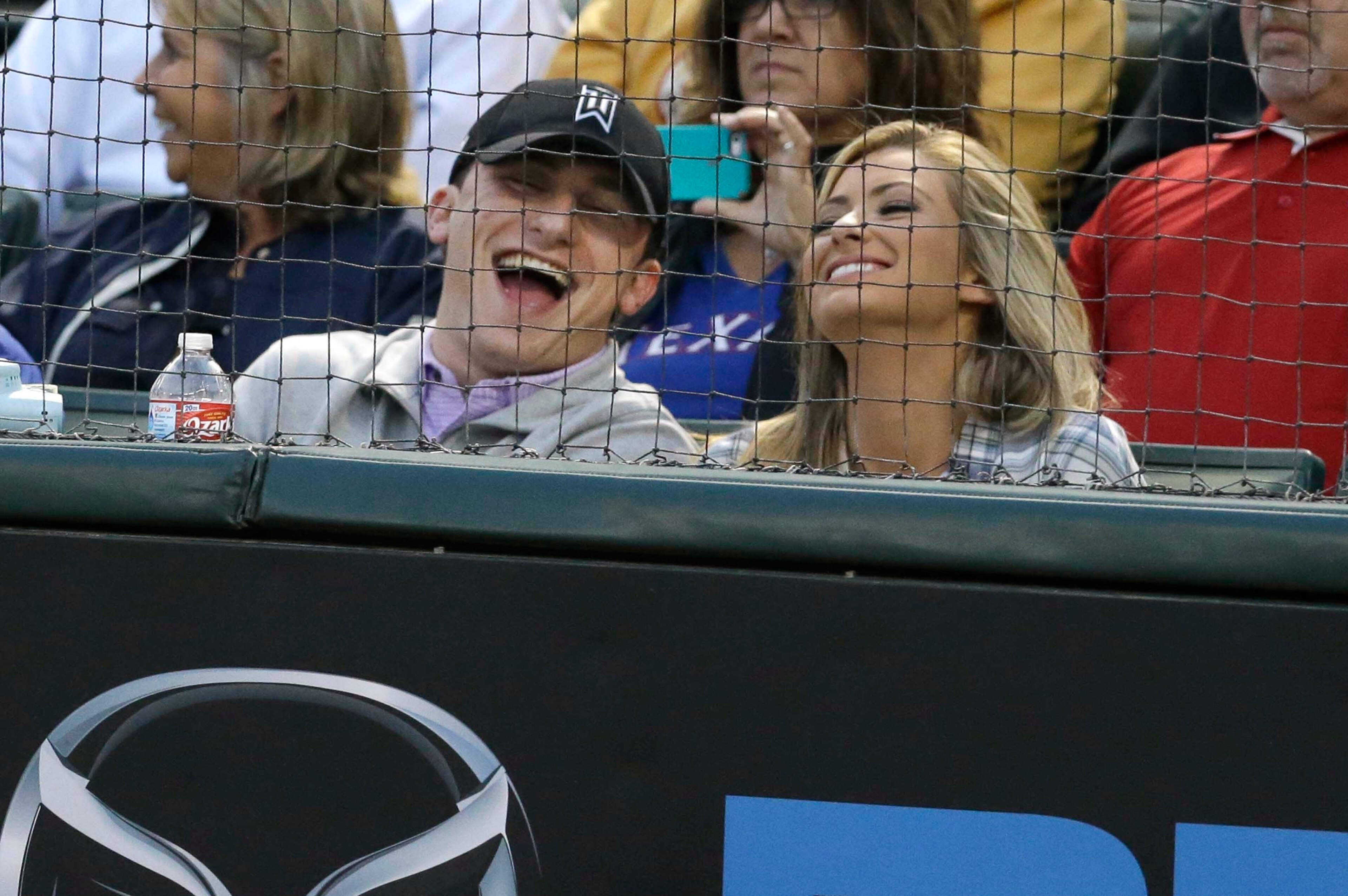 Johnny Manziel and a friend at a Texas Rangers game.