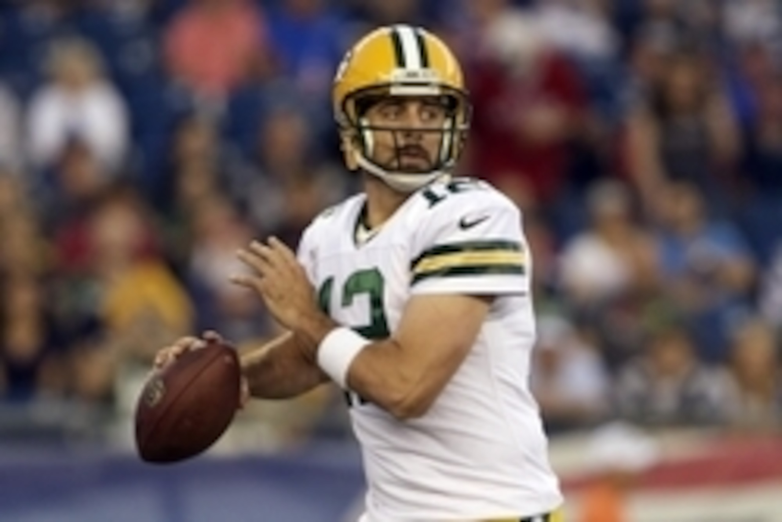 Aug 13, 2015; Foxborough, MA, USA; Green Bay Packers quarterback Aaron Rodgers (12) looks to pass during the first quarter against the New England Patriots in a preseason NFL football game at Gillette Stadium. Mandatory Credit: David Butler II-USA TODAY S Aug 13, 2015; Foxborough, MA, USA; Green Bay Packers quarterback Aaron Rodgers (12) looks to pass during the first quarter against the New England Patriots in a preseason NFL football game at Gillette Stadium. Mandatory Credit: David Butler II-USA TODAY S