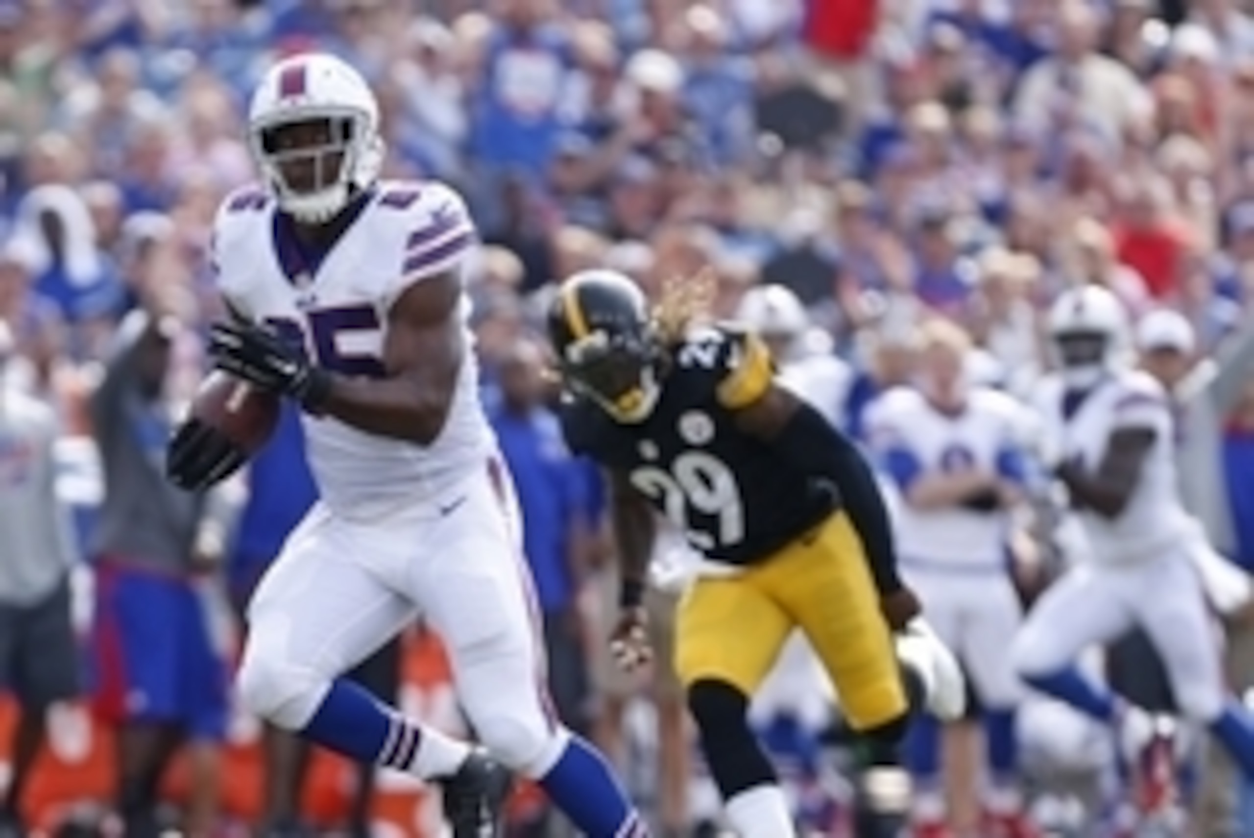 Aug 29, 2015; Orchard Park, NY, USA; Buffalo Bills tight end Charles Clay (85) runs for a touchdown after a catch from quarterback EJ Manuel (3) as Pittsburgh Steelers strong safety Shamarko Thomas (29) pursues during the first quarter at Ralph Wilson Sta