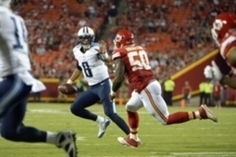 Aug 28, 2015; Kansas City, MO, USA; Tennessee Titans quarterback Marcus Mariota (8) is pressured by Kansas City Chiefs outside linebacker Justin Houston (50) in the first half at Arrowhead Stadium. Mandatory Credit: John Rieger-USA TODAY Sports