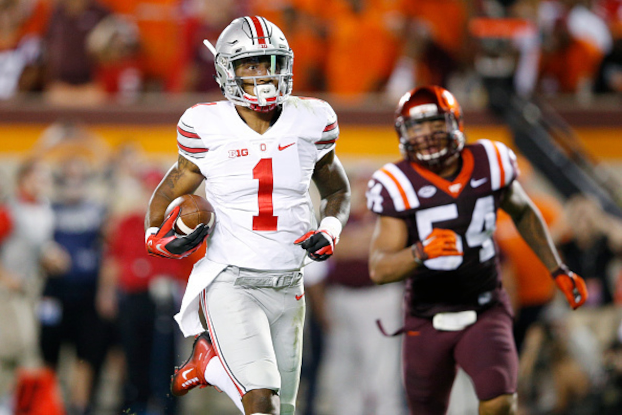 BLACKSBURG, VA - SEPTEMBER 7: Braxton Miller #1 of the Ohio State Buckeyes runs for a 53-yard touchdown in the third quarter against the Virginia Tech Hokies at Lane Stadium on September 7, 2015 in Blacksburg, Virginia. (Photo by Joe Robbins/Getty Images)