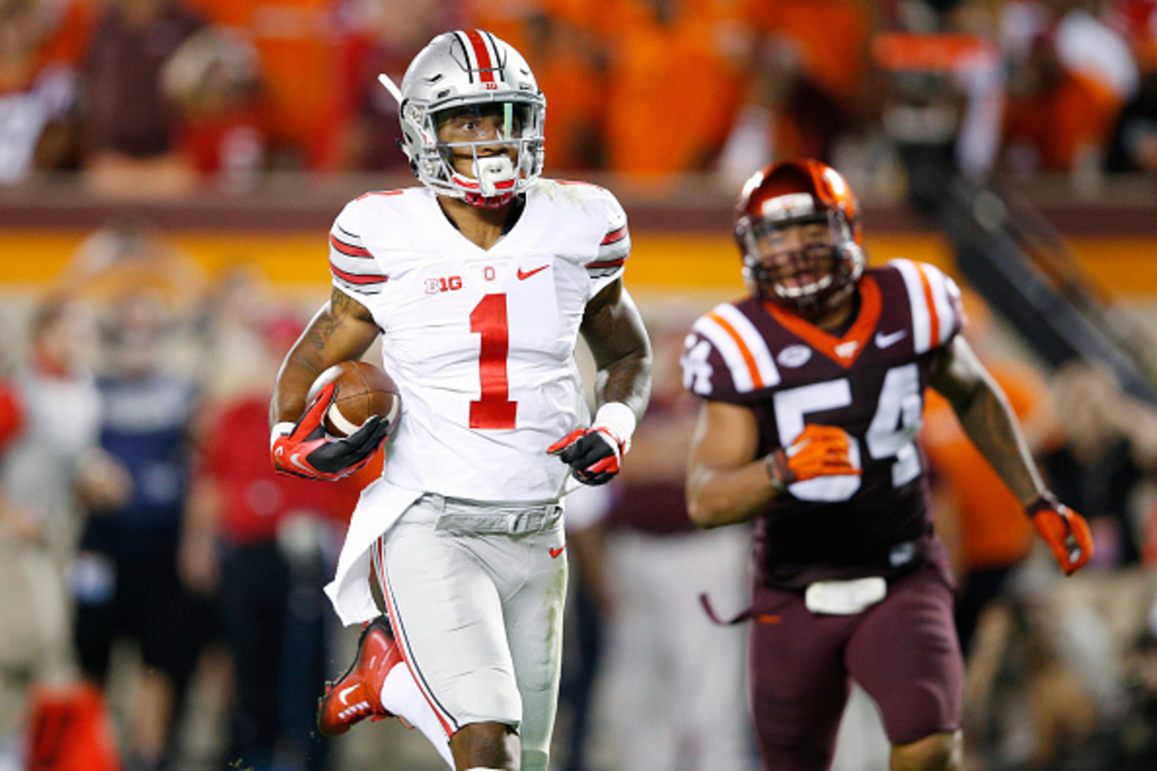 BLACKSBURG, VA - SEPTEMBER 7: Braxton Miller #1 of the Ohio State Buckeyes runs for a 53-yard touchdown in the third quarter against the Virginia Tech Hokies at Lane Stadium on September 7, 2015 in Blacksburg, Virginia. (Photo by Joe Robbins/Getty Images)