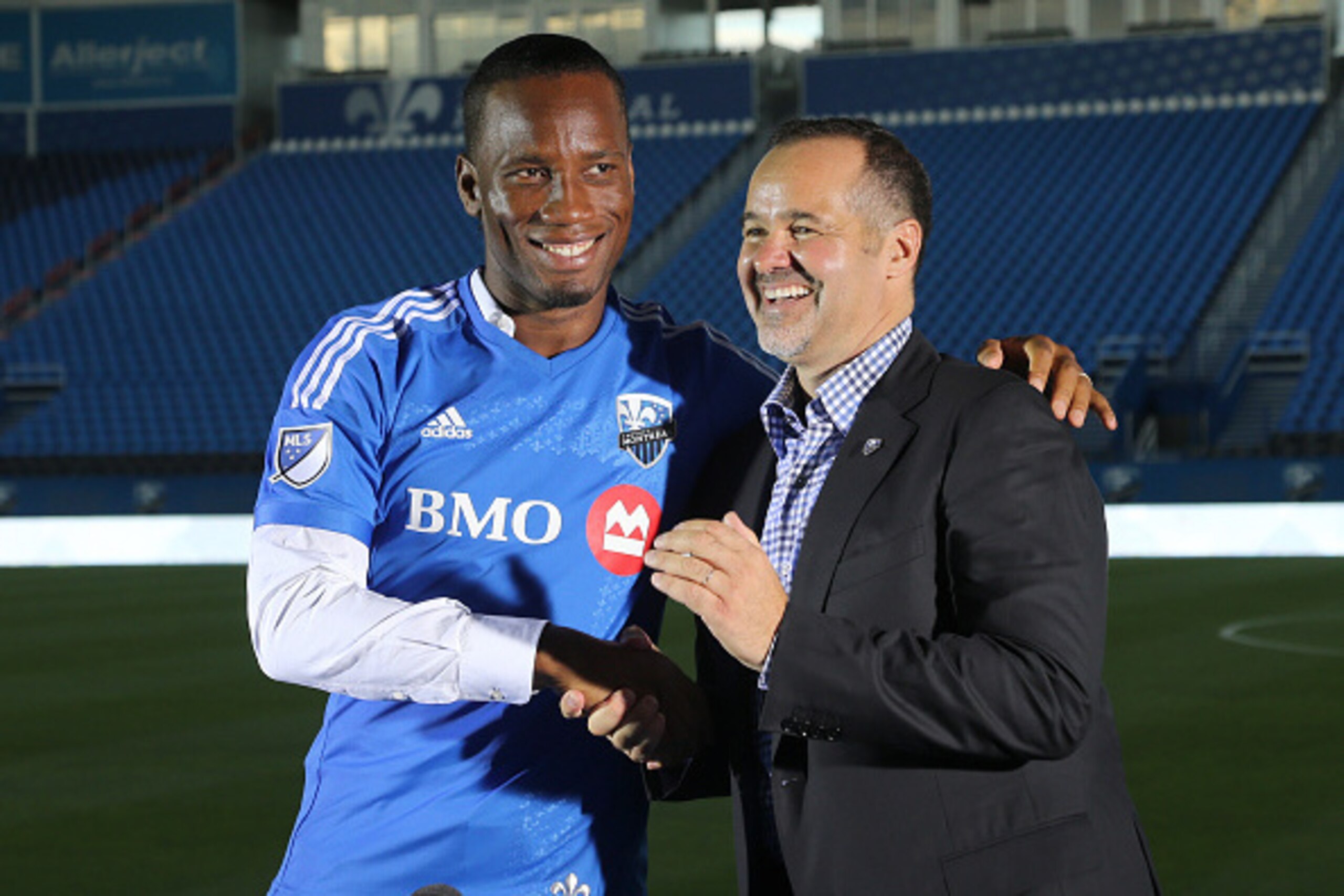 MONTREAL, QC - JULY 30: Former Chelsea player Didier Drogba of the Ivory Coast is presented by President of MLS team Montreal Impact Joey Saputo to fans during a jersey presentation and press conference at Stade Saputo on July 30, 2015 in Montreal, Quebec