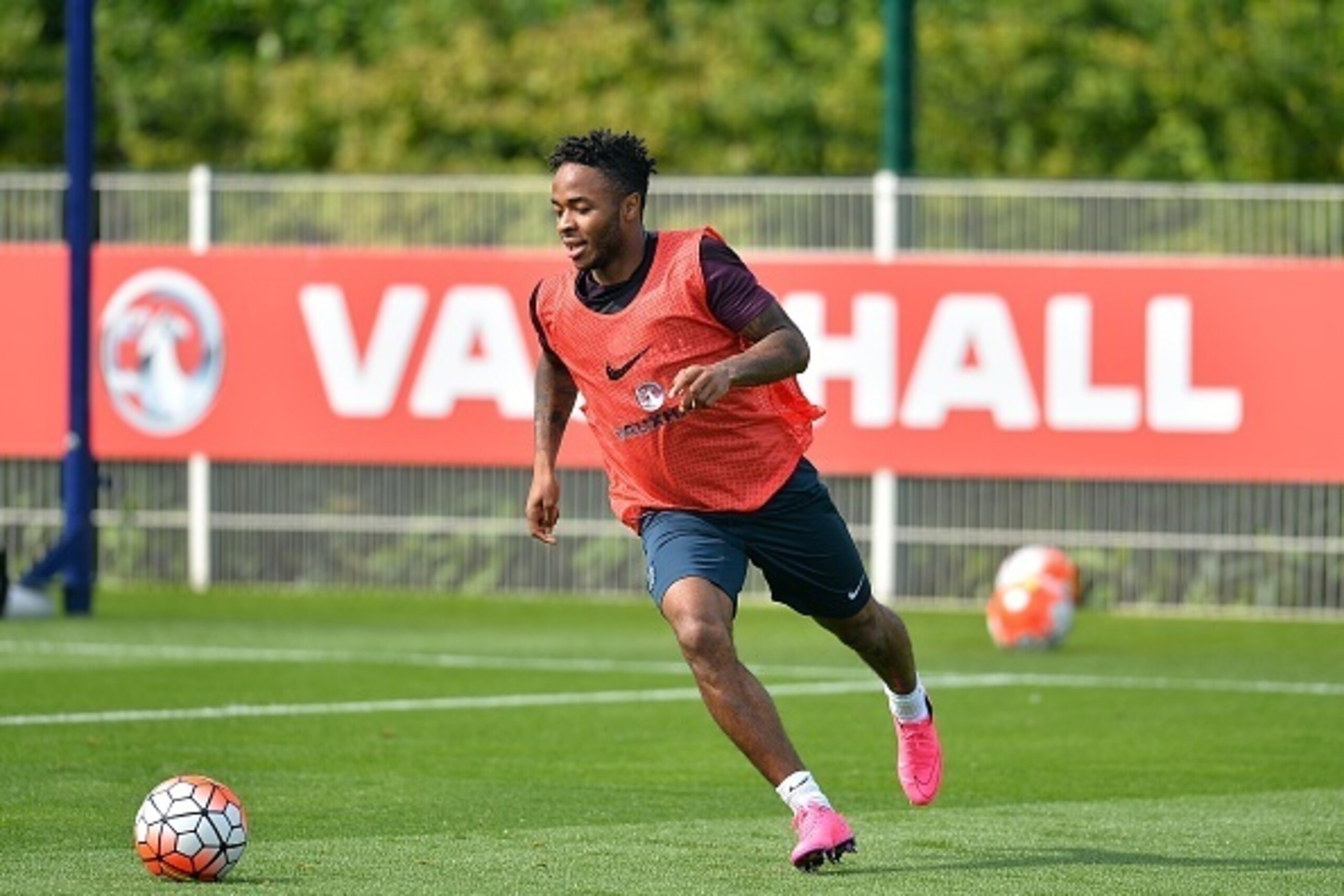 England striker Raheem Sterling chases the ball during a team training session at Tottenham Hotspur Training Centre in London on September 7, 2015, ahead of their UEFA Euro 2016 qualifying football match against Switzerland at Wembley Stadium on September
