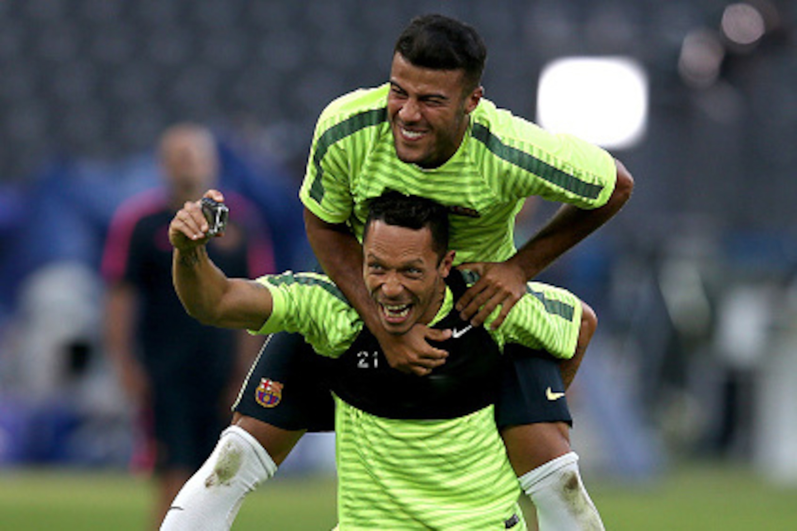 BERLIN, GERMANY - JUNE 5: Adriano and Rafinha fool around during the FC Barcelona training session on the eve of the UEFA Champions League Final match against Juventus at the Olympiastadion on June 5, 2015 in Berlin, Germany. (Photo by Chris Brunskill Ltd