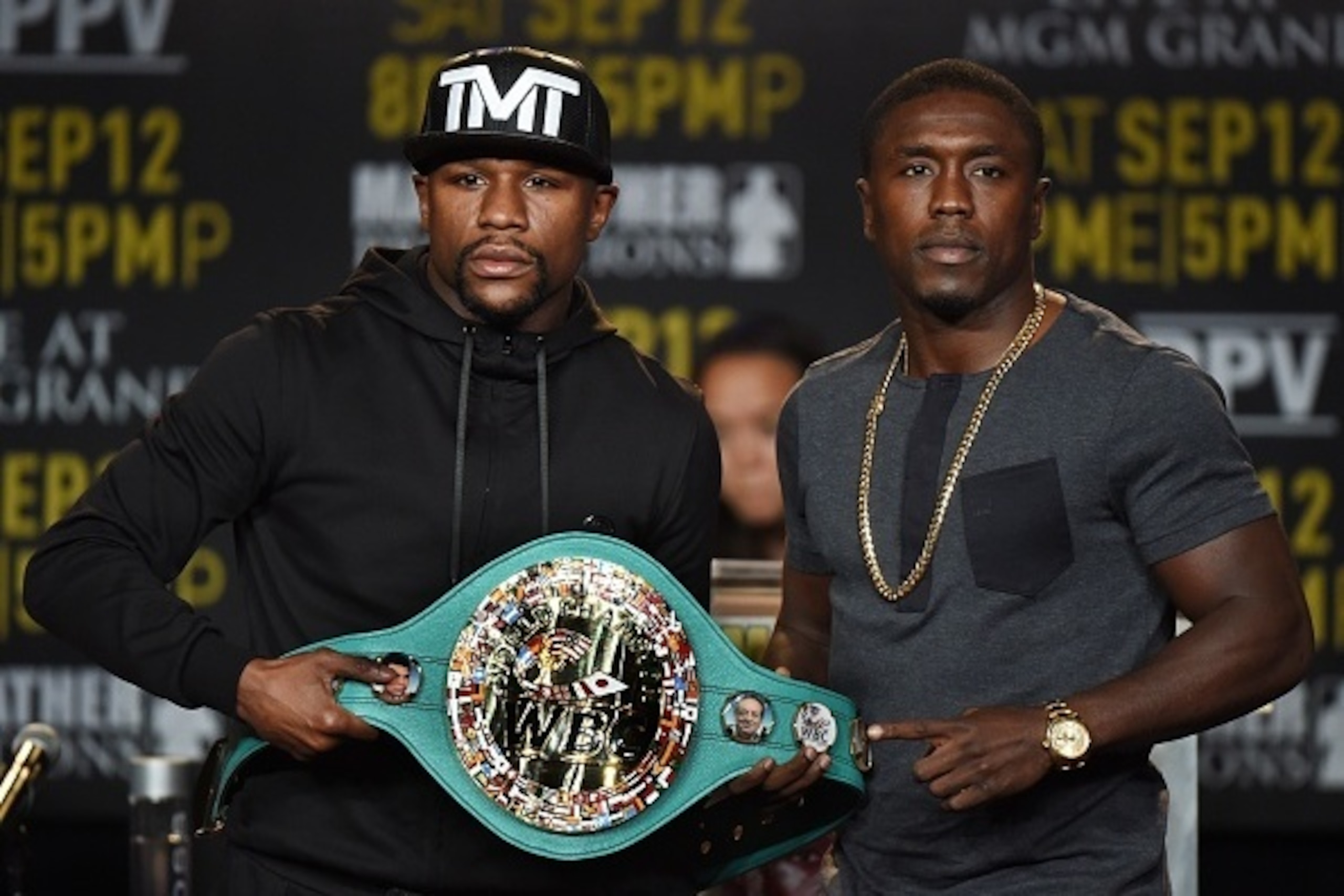 Boxers Floyd 'Money' Mayweather (L) and Andre Berto (R) face off during a press conference to officially announce their September 12 fight that will place at the MGM Grand Garden Arena in Las Vegas, at the Marriott Hotel in Los Angeles, California on Augu