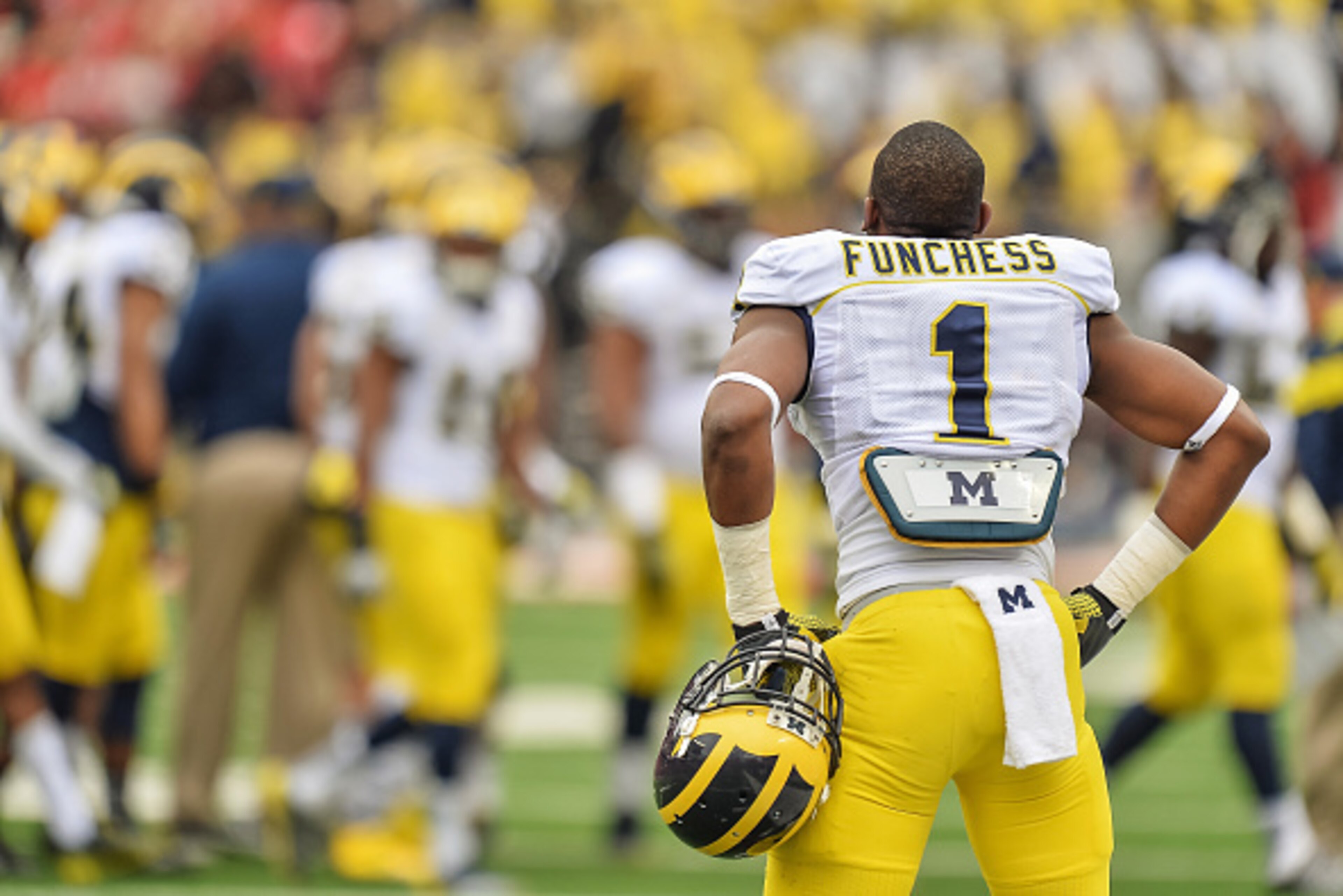 COLUMBUS, OH - NOVEMBER 29:  Devin Funchess #1 of the Michigan Wolverines watches his team from the sidelines against  the Ohio State Buckeyes at Ohio Stadium on November 29, 2014 in Columbus, Ohio. Ohio State defeated Michigan 42-28.  (Photo by Jamie Sab