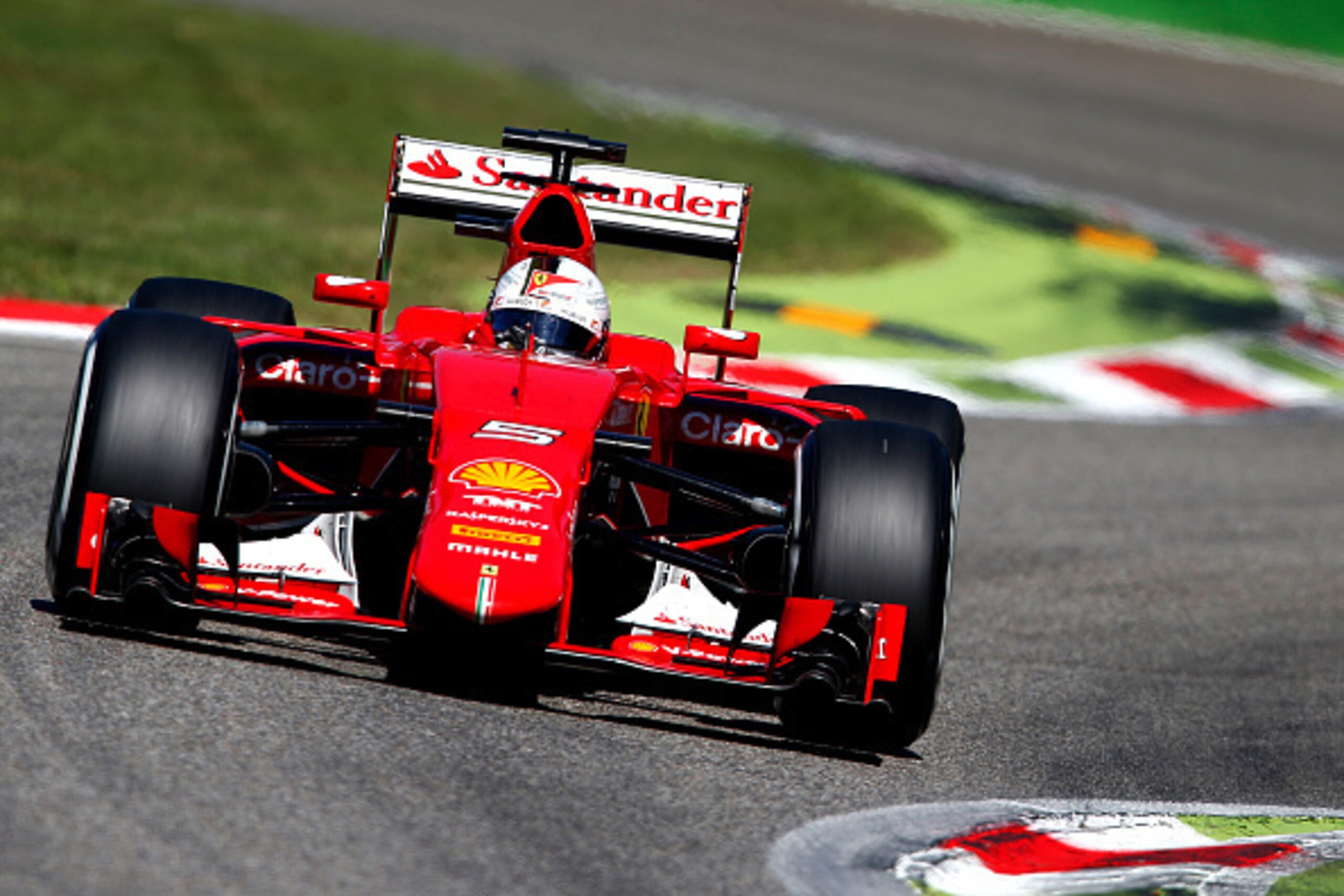 MONZA, ITALY - SEPTEMBER 06:  Kimi Raikkonen of Finland and Ferrari drives during the Formula One Grand Prix of Italy at Autodromo di Monza on September 6, 2015 in Monza, Italy.  (Photo by Charles Coates/Getty Images)