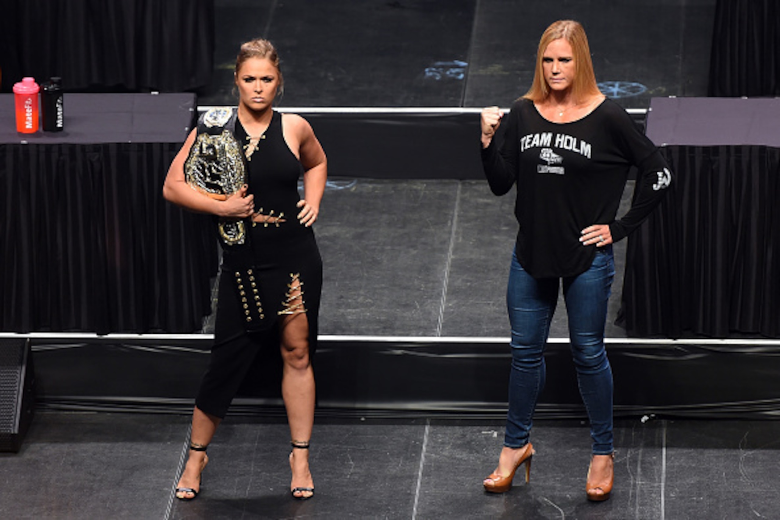 LAS VEGAS, NEVADA - SEPTEMBER 04:  (L-R) UFC women's bantamweight champion Ronda 'Rowdy' Rousey and challenger Holly Holm pose for the media during the UFC's Go Big launch event inside MGM Grand Garden Arena on September 4, 2015 in Las Vegas, Nevada. (Pho
