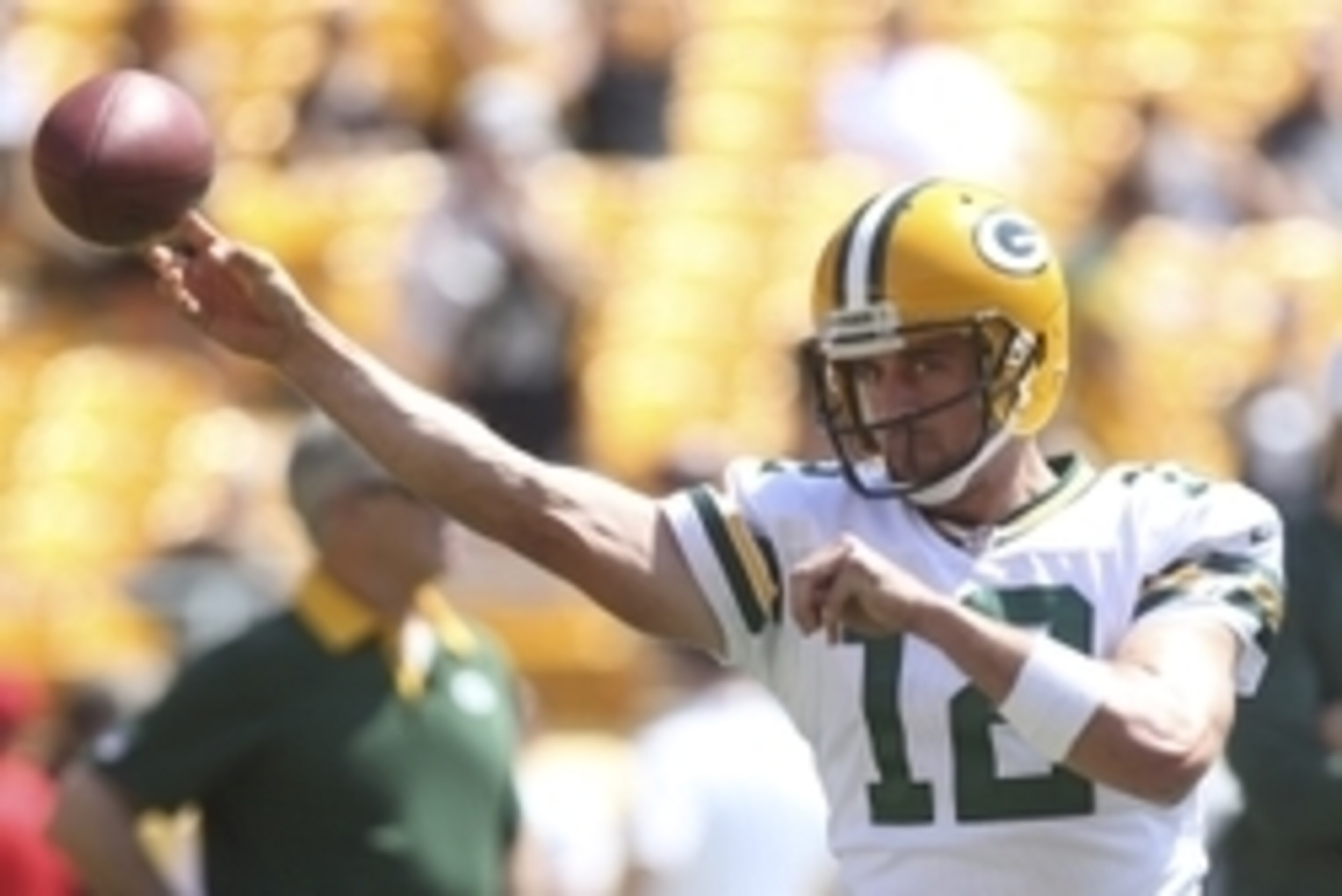 Aug 23, 2015; Pittsburgh, PA, USA; Green Bay Packers quarterback Aaron Rodgers (12) warms up on the field before playing the Pittsburgh Steelers at Heinz Field. Mandatory Credit: Charles LeClaire-USA TODAY Sports